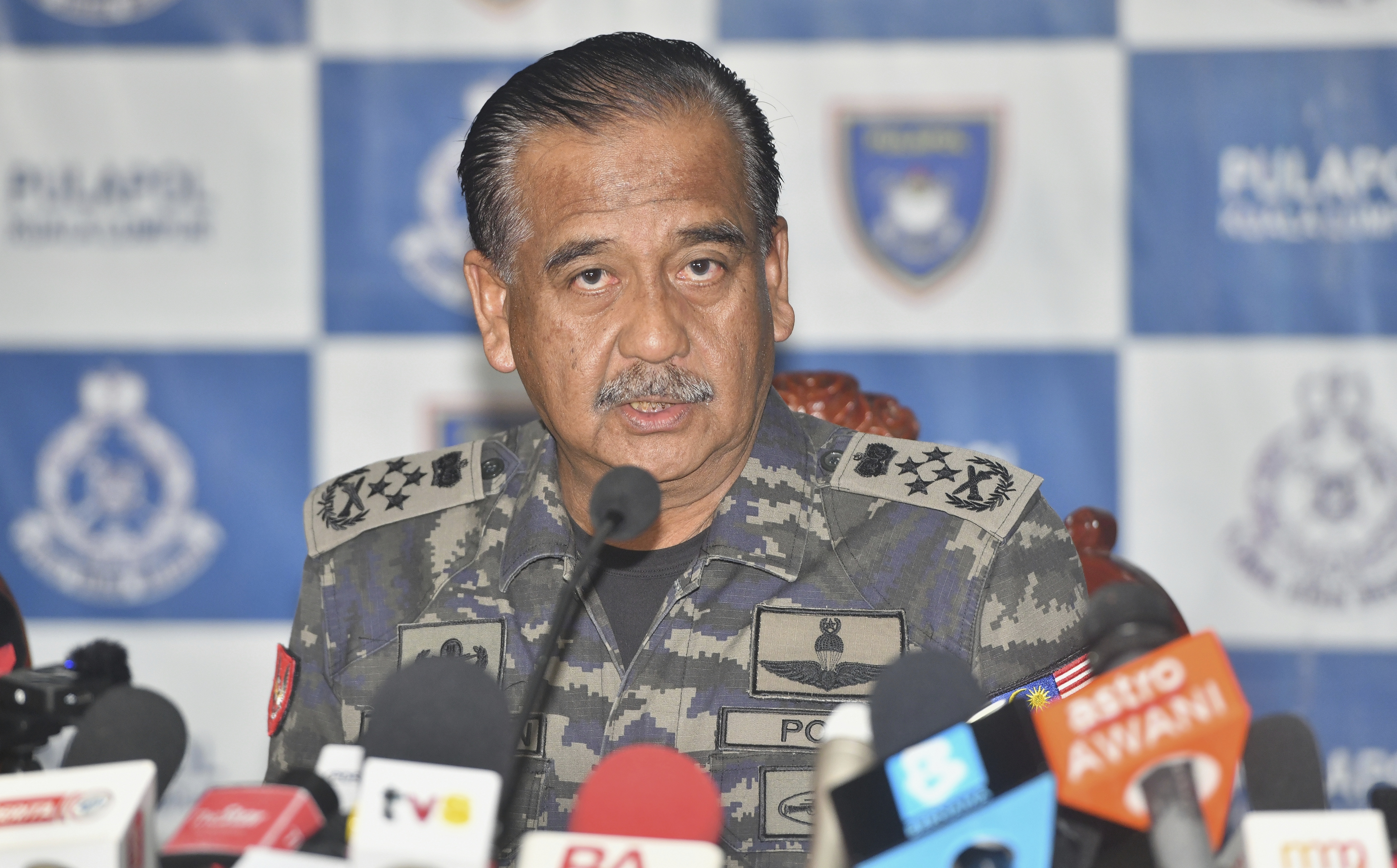 Malaysia Inspectors-General of Police Razarudin Husain speaks during a press conference in Kuala Lumpur, Monday, Sept. 23, 2024. (AP Photo)