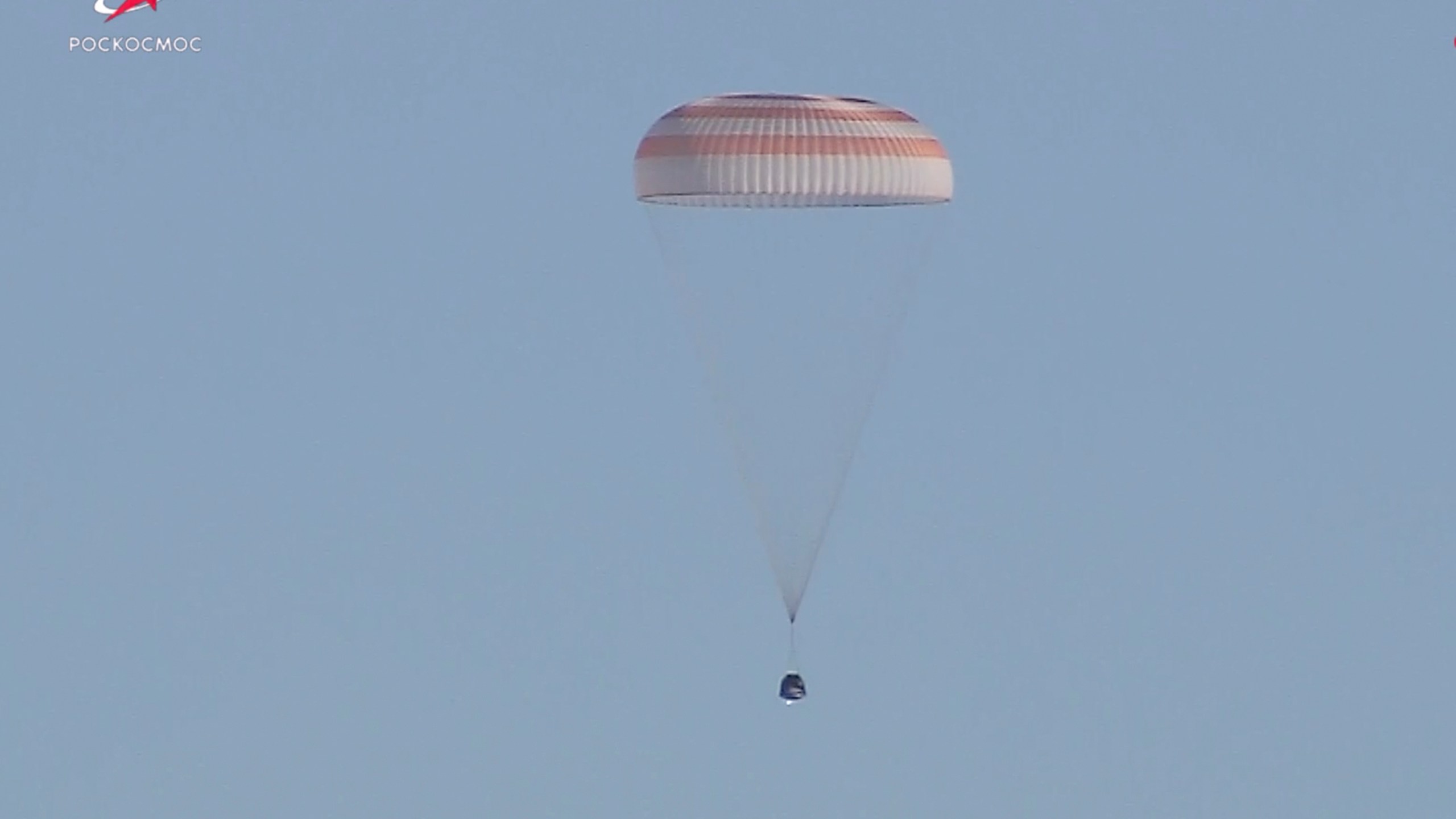 In this photo taken from video released by Roscosmos space corporation, Russian Soyuz MS-25 space capsule carrying the NASA astronaut Tracy Dyson and the Roscosmos cosmonauts Oleg Kononenko and Nikolai Chub descends south-east of the Kazakh town of Zhezkazgan, Kazakhstan, Monday, Sept. 23, 2024. (Roscosmos space corporation via AP)