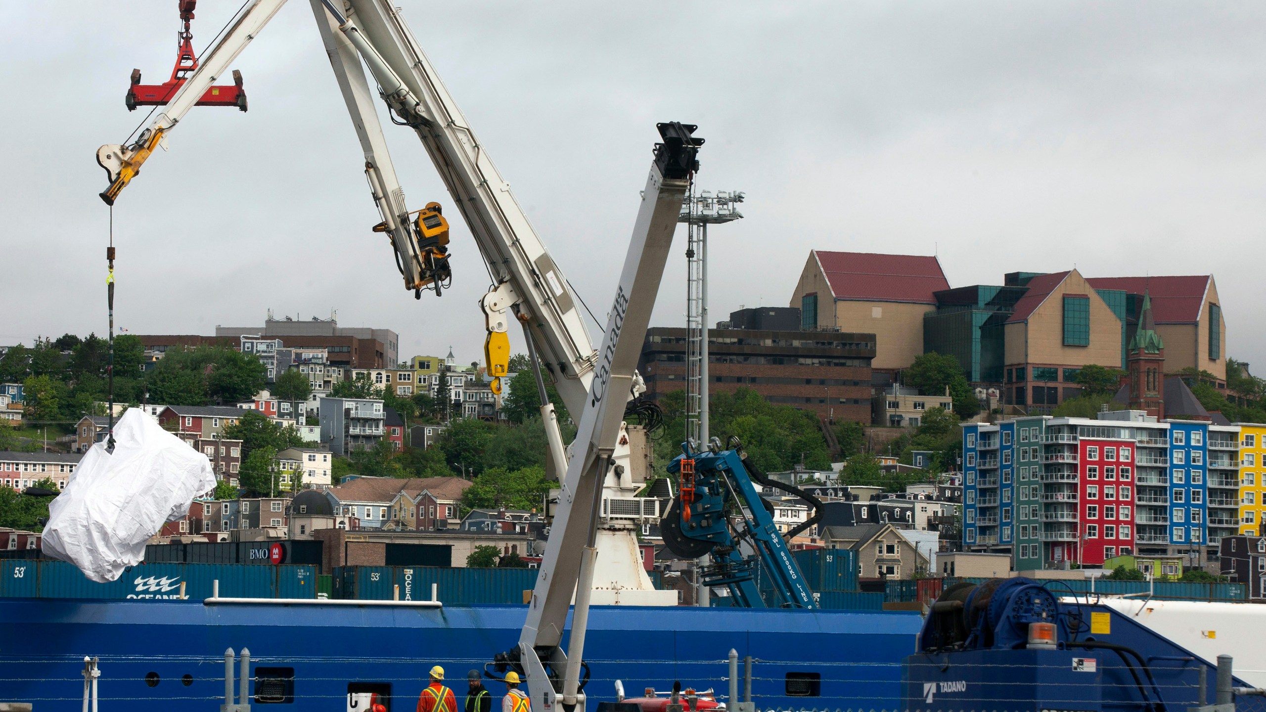 FILE - Debris from the Titan submersible, recovered from the ocean floor near the wreck of the Titanic, is unloaded from the ship Horizon Arctic at the Canadian Coast Guard pier in St. John's, Newfoundland, June 28, 2023. (Paul Daly/The Canadian Press via AP, File)