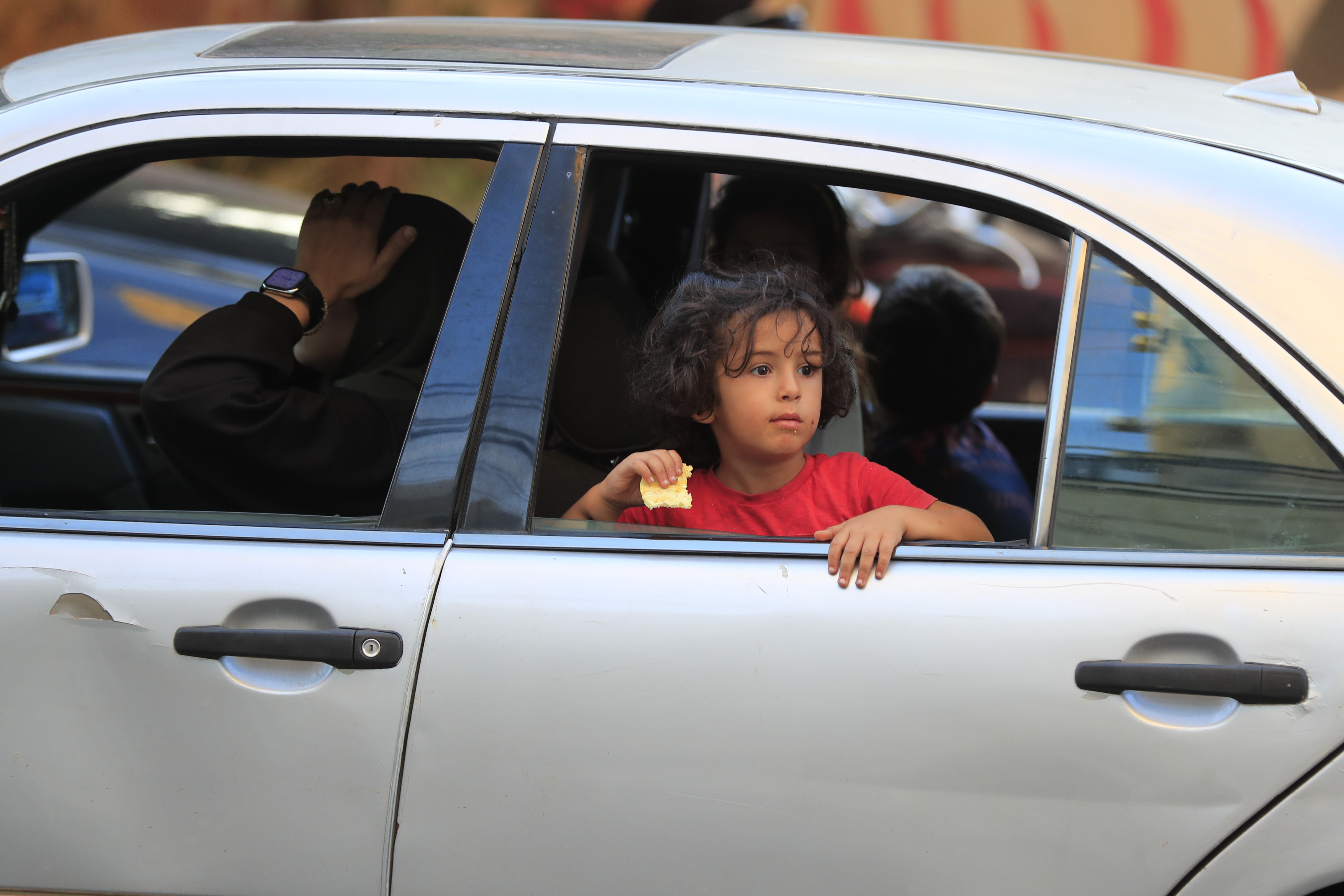 Cars sit in traffic as people flee the southern villages amid ongoing Israeli airstrikes, in Sidon, Lebanon, Monday, Sept. 23, 2024. (AP Photo/Mohammed Zaatari)