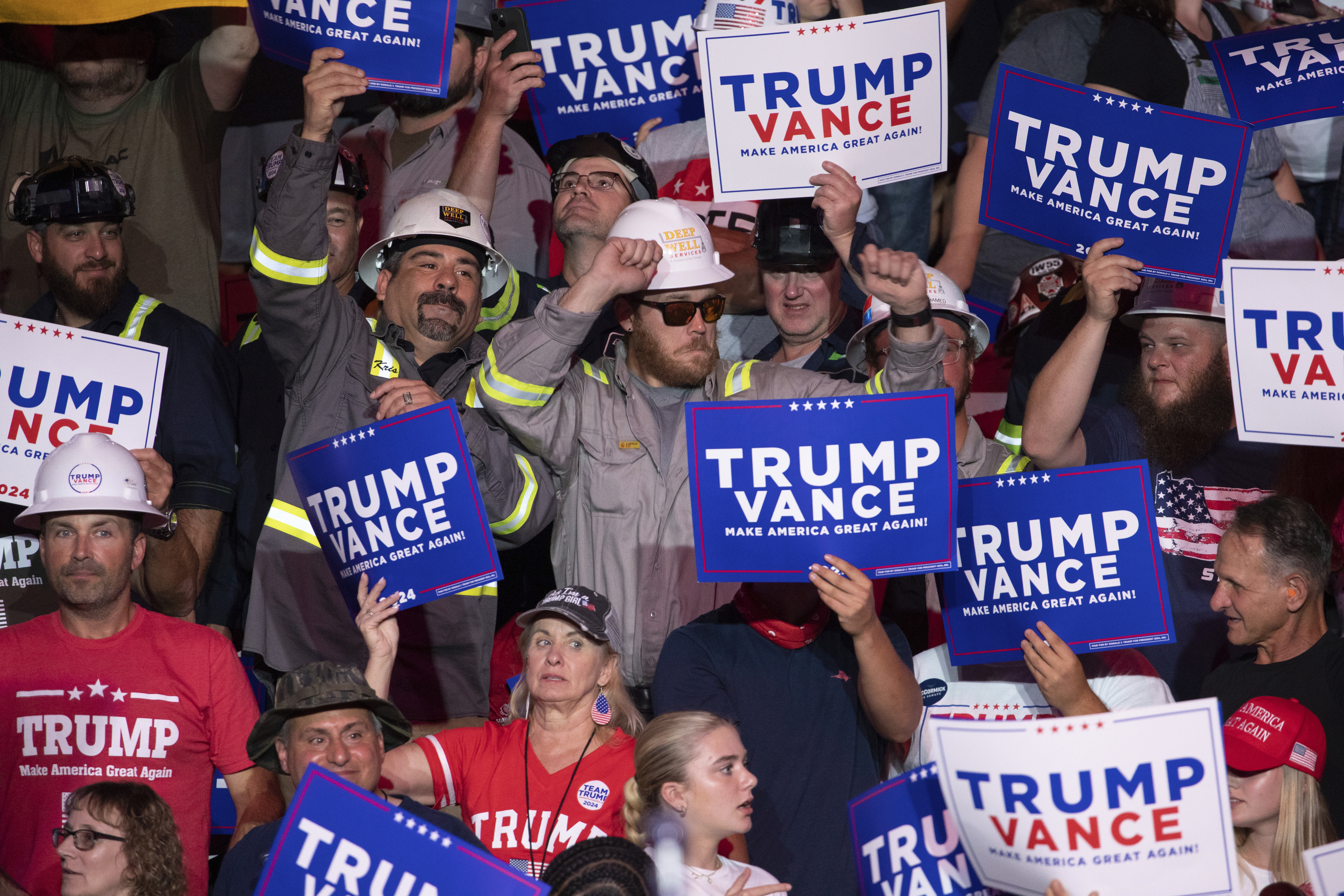 Members of the crowd dance as they wait for Republican presidential nominee former President Donald Trump to begin speaking during a campaign rally at Ed Fry Arena in Indiana, Pa., Monday, Sept. 23, 2024. (AP Photo/Rebecca Droke)