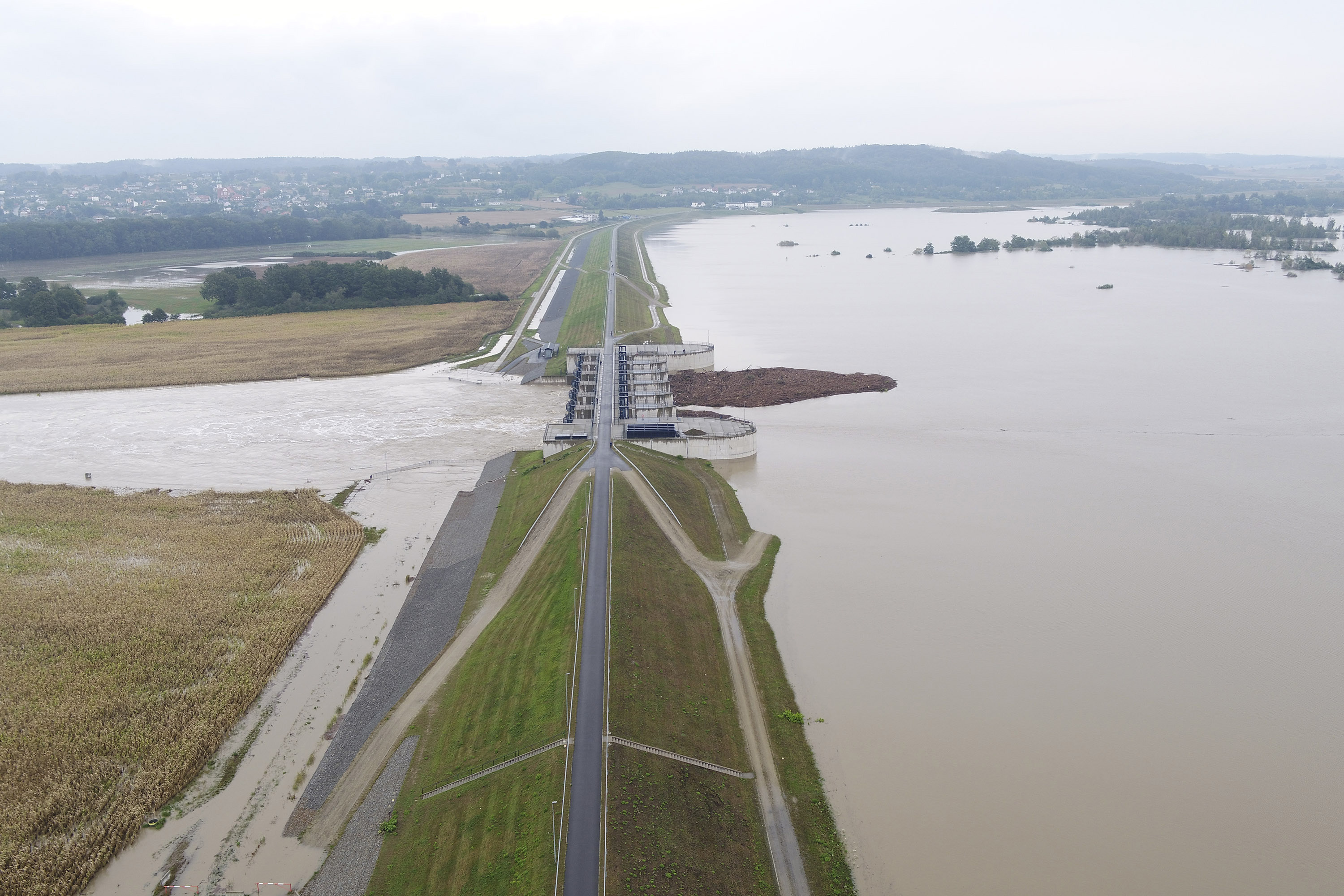 This photo provided by the state company Polish Waters shows the Oder River flood waters channelled into and contained by the newly-built Lower Raciborz Reservoir that has spared the cities of Opole and Wroclaw from flooding, in Raciborz, southwestern Poland, Sept. 16, 2024. (Polish Waters via AP)