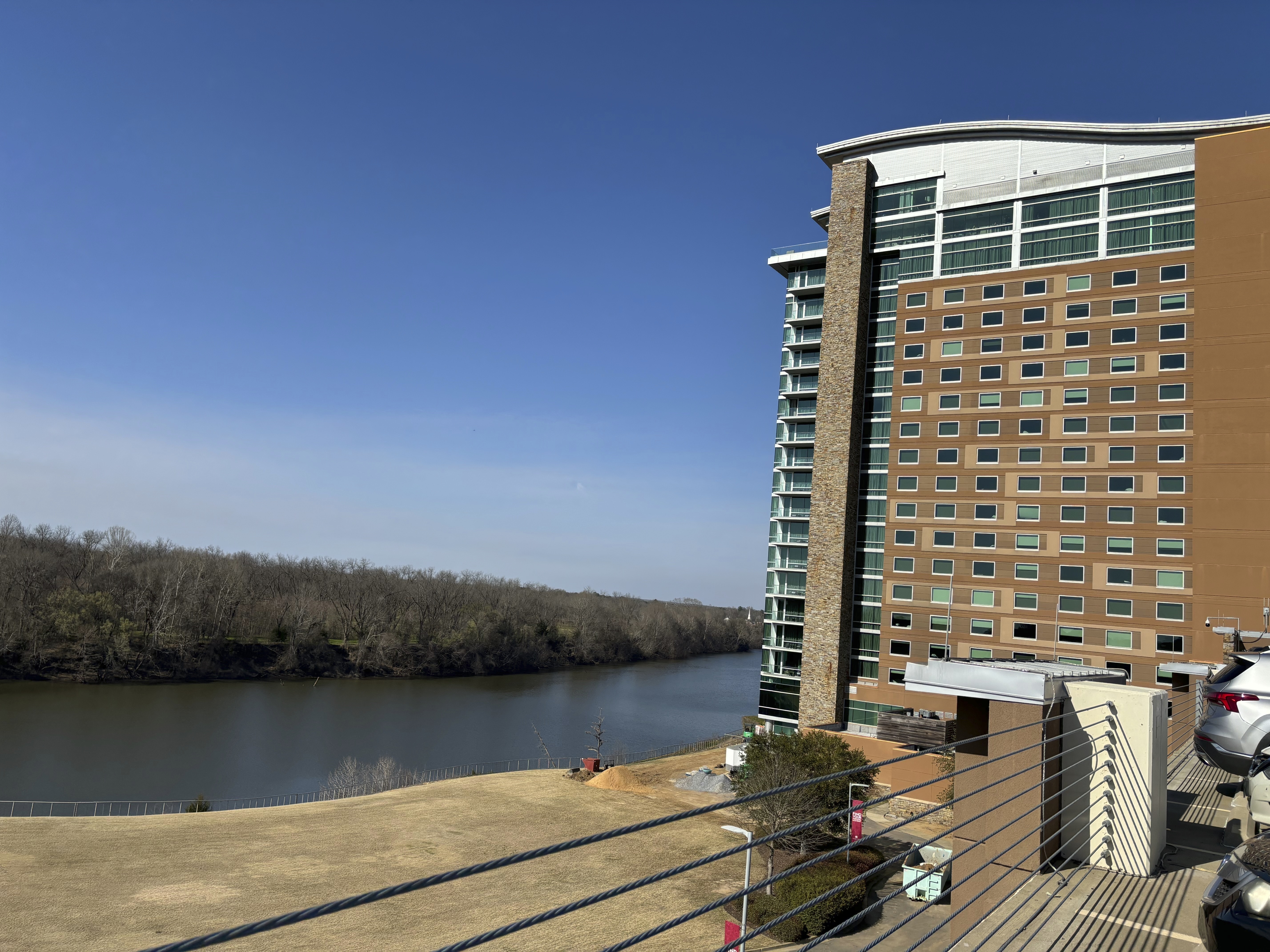 The Wind Creek Casino and Hotel overlooking the Coosa River is seen on Feb. 25, 2024, in Wetumpka, Ala., where the Oklahoma-based Muscogee (Creek) Nation contends Alabama's Poarch Band of Creek Indians broke their legal promise to preserve a historic Muscogee site when they acquired it in 1980. (AP Photo/Kim Chandler)