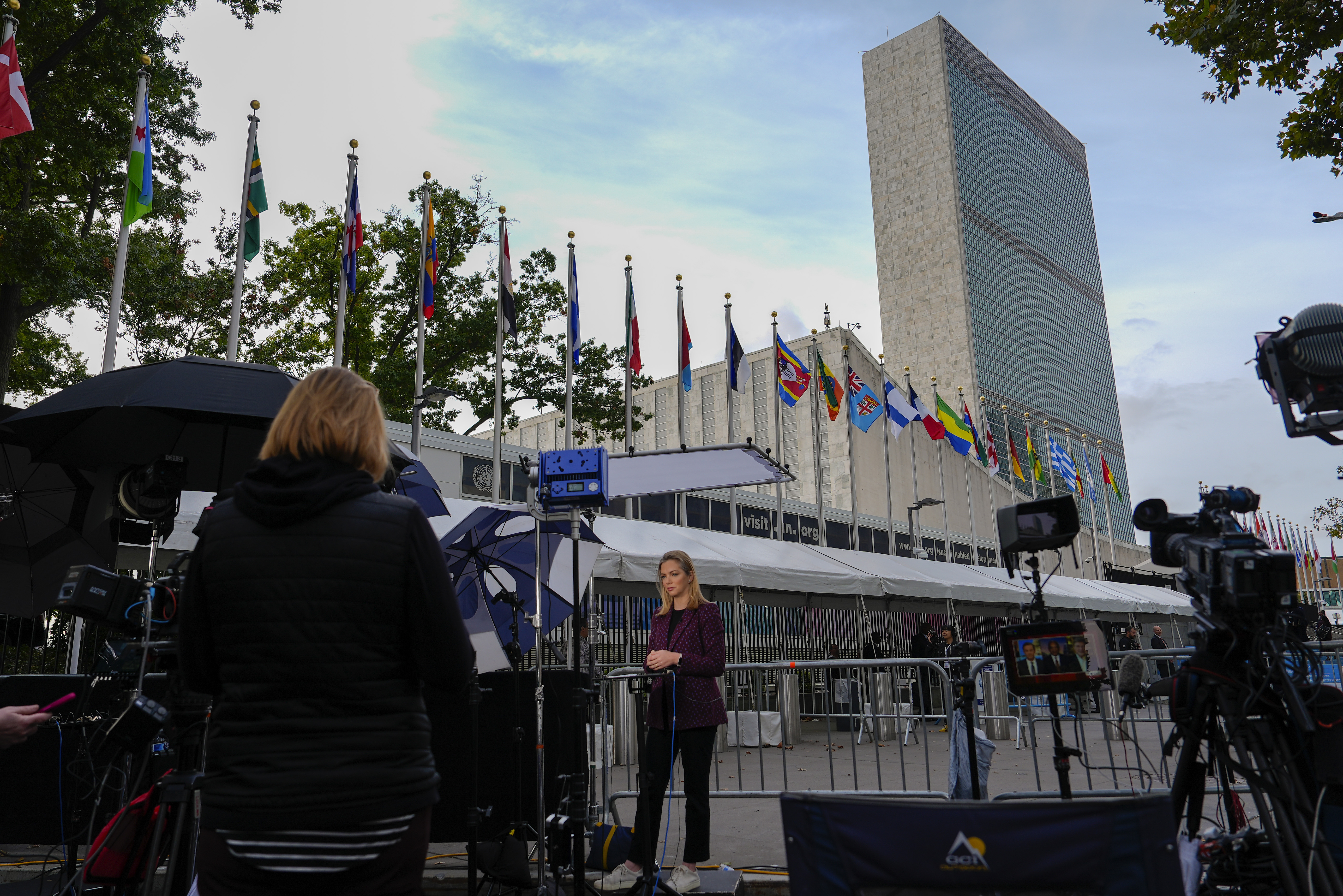 Television networks broadcast outside the United Nations before the start of the 79th Session of the UN General Assembly, Tuesday, Sept. 24, 2024, at UN headquarters. (AP Photo/Julia Demaree Nikhinson)