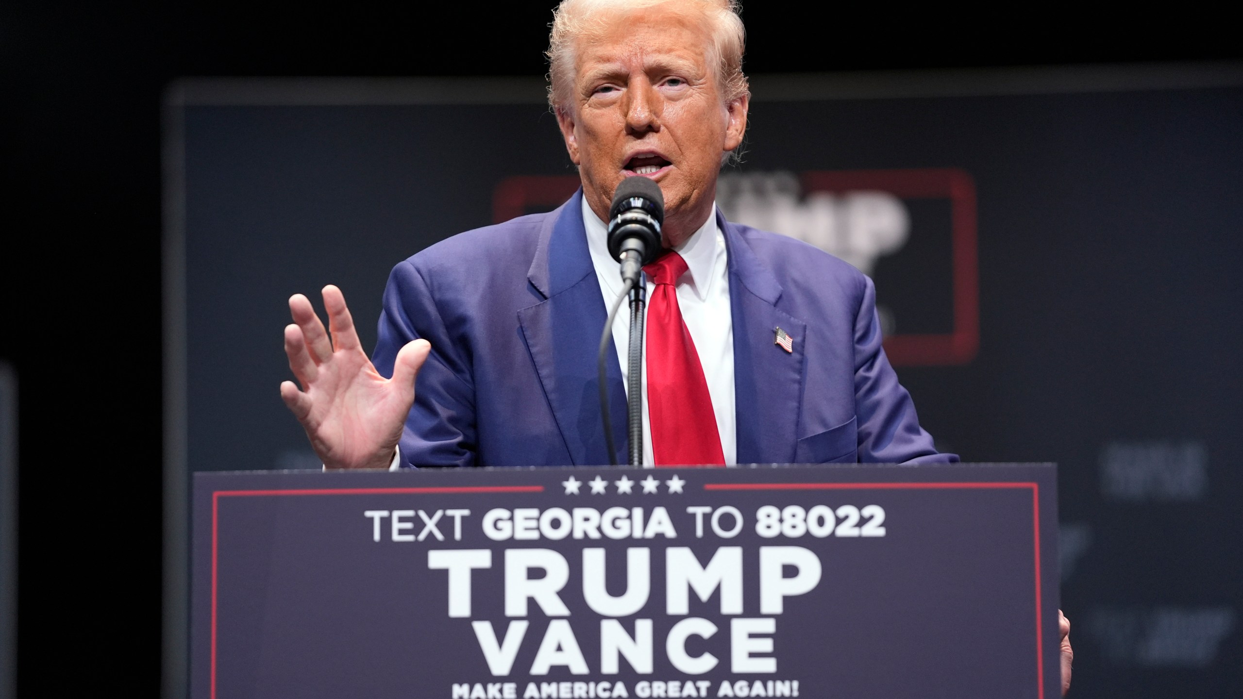 Republican presidential nominee former President Donald Trump speaks about the tax code and manufacturing at the Johnny Mercer Theatre Civic Center, Tuesday, Sept. 24, 2024, in Savannah, Ga. (AP Photo/Evan Vucci)