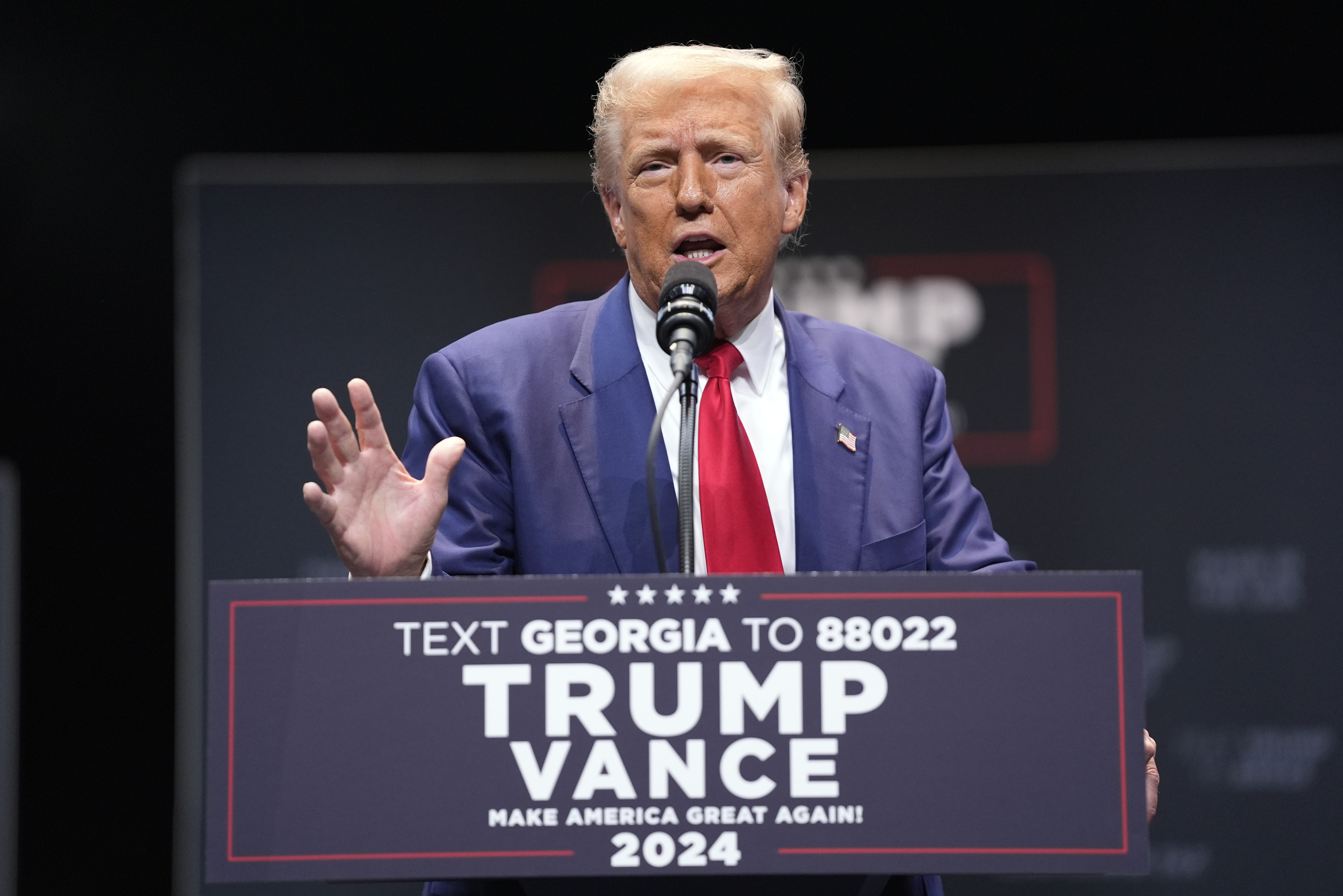 Republican presidential nominee former President Donald Trump speaks about the tax code and manufacturing at the Johnny Mercer Theatre Civic Center, Tuesday, Sept. 24, 2024, in Savannah, Ga. (AP Photo/Evan Vucci)