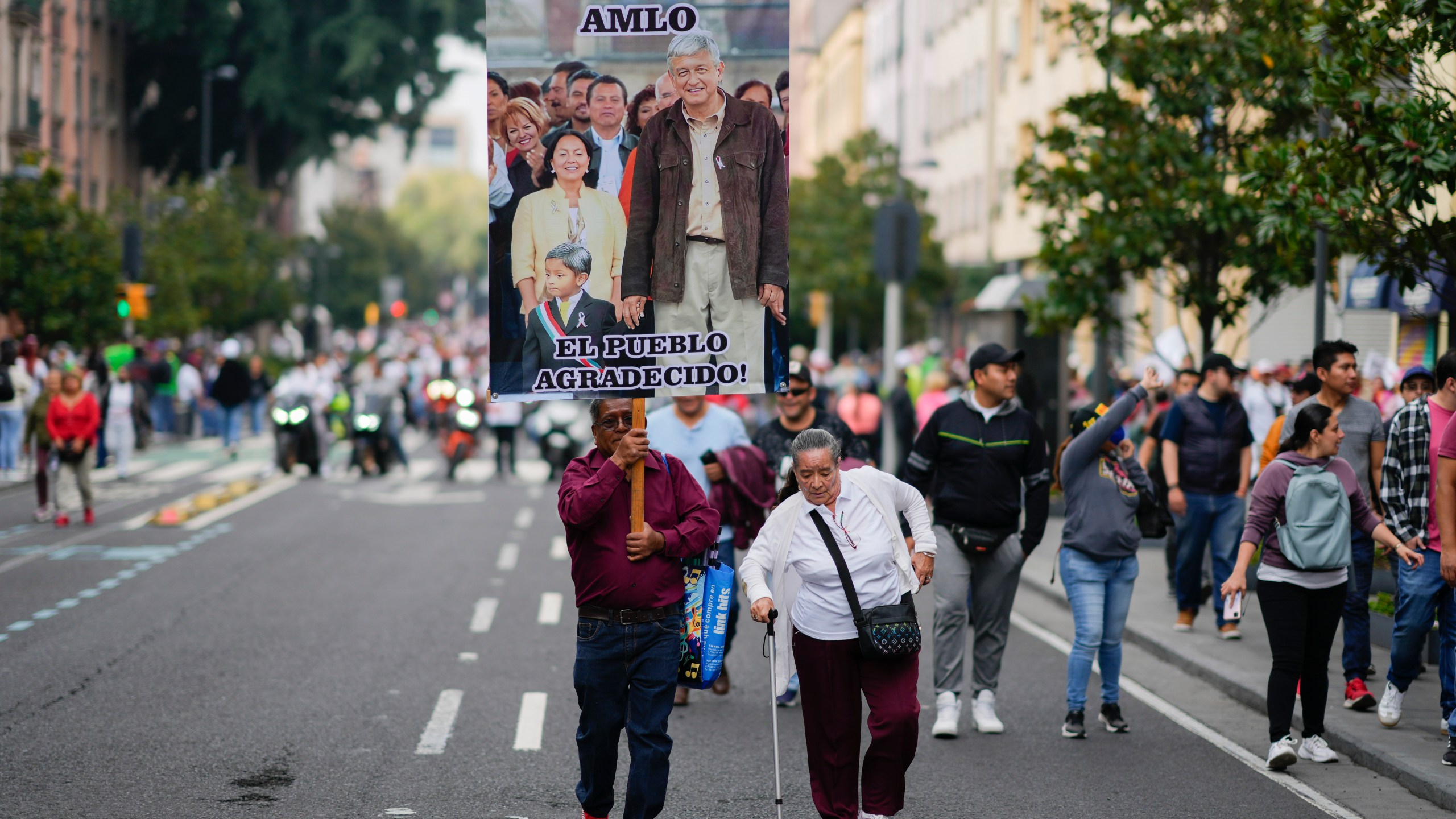 FILE - People arrive to the Zocalo for outgoing Mexican President Andres Manuel Lopez Obrador's last State of the Nation address in Mexico City, Sept. 1, 2024. (AP Photo/Eduardo Verdugo, File)