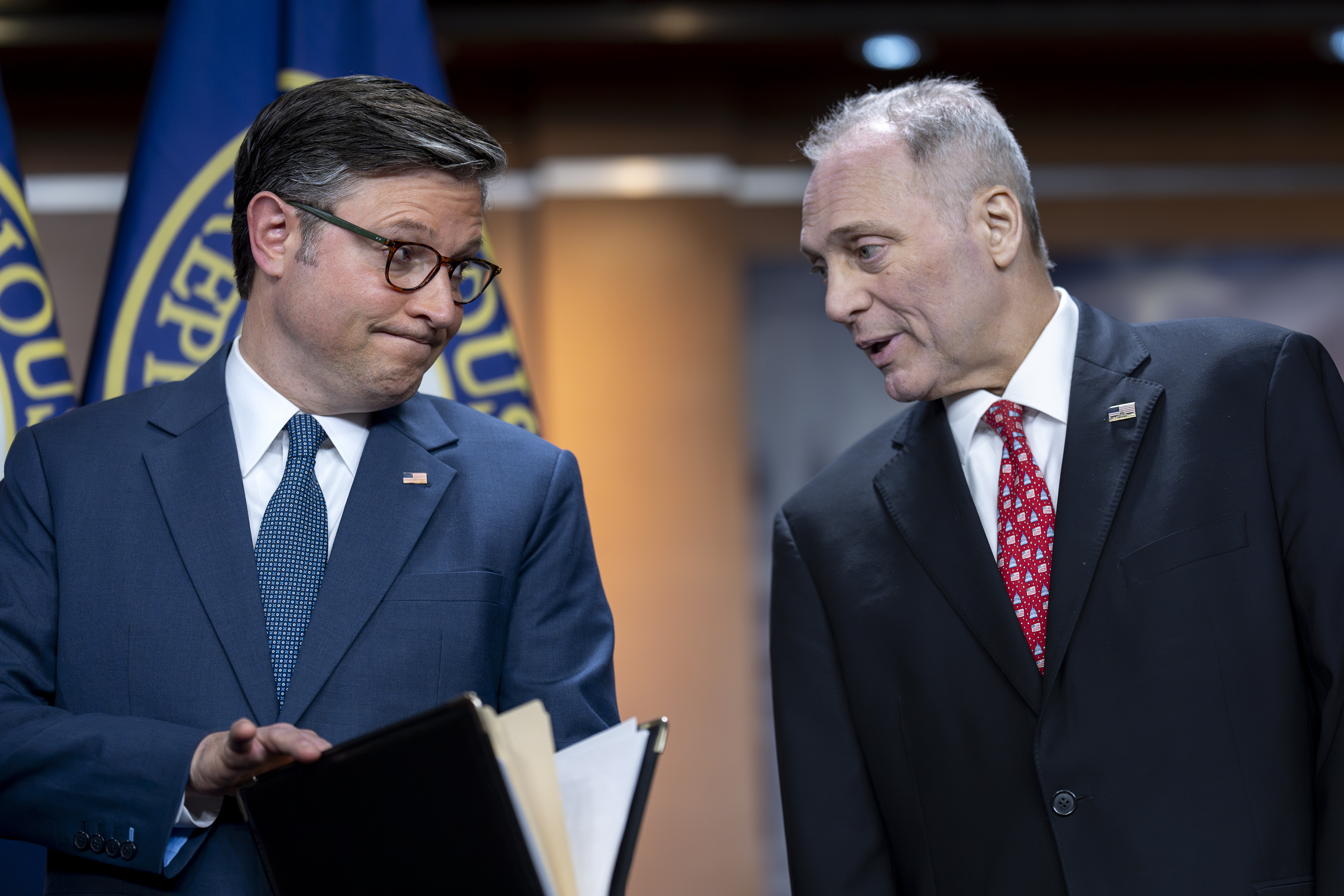 Speaker of the House Mike Johnson, R-La., left, confers with House Majority Leader Steve Scalise, R-La., as they meet with reporters after a closed-door meeting with fellow Republicans, at the Capitol in Washington, Tuesday, Sept. 24, 2024. (AP Photo/J. Scott Applewhite)