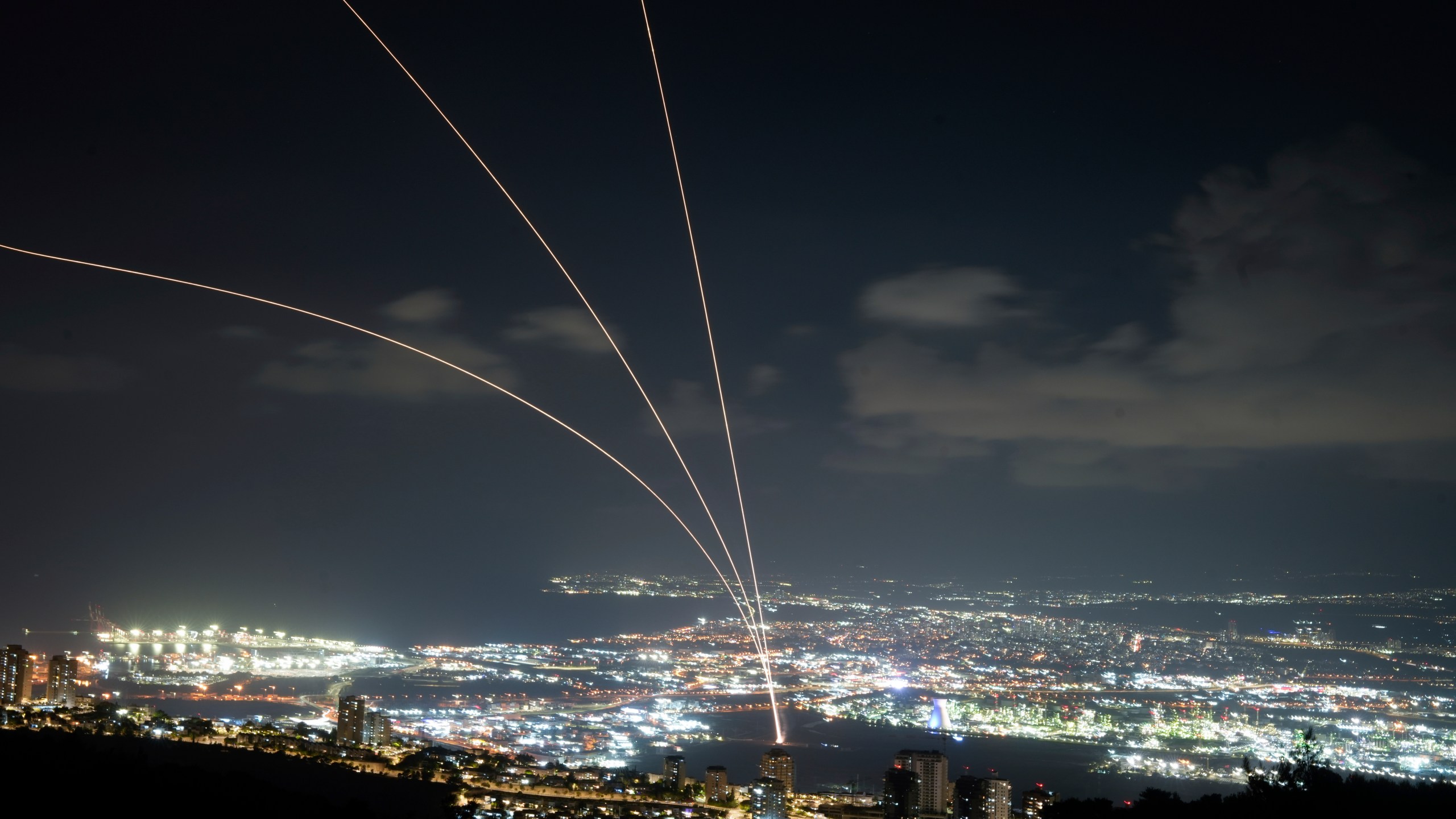 Israeli Iron Dome air defense system fires to intercept rockets that were launched from Lebanon, as seen from Haifa, northern Israel, Monday, Sept. 23, 2024. (AP Photo/Baz Ratner)