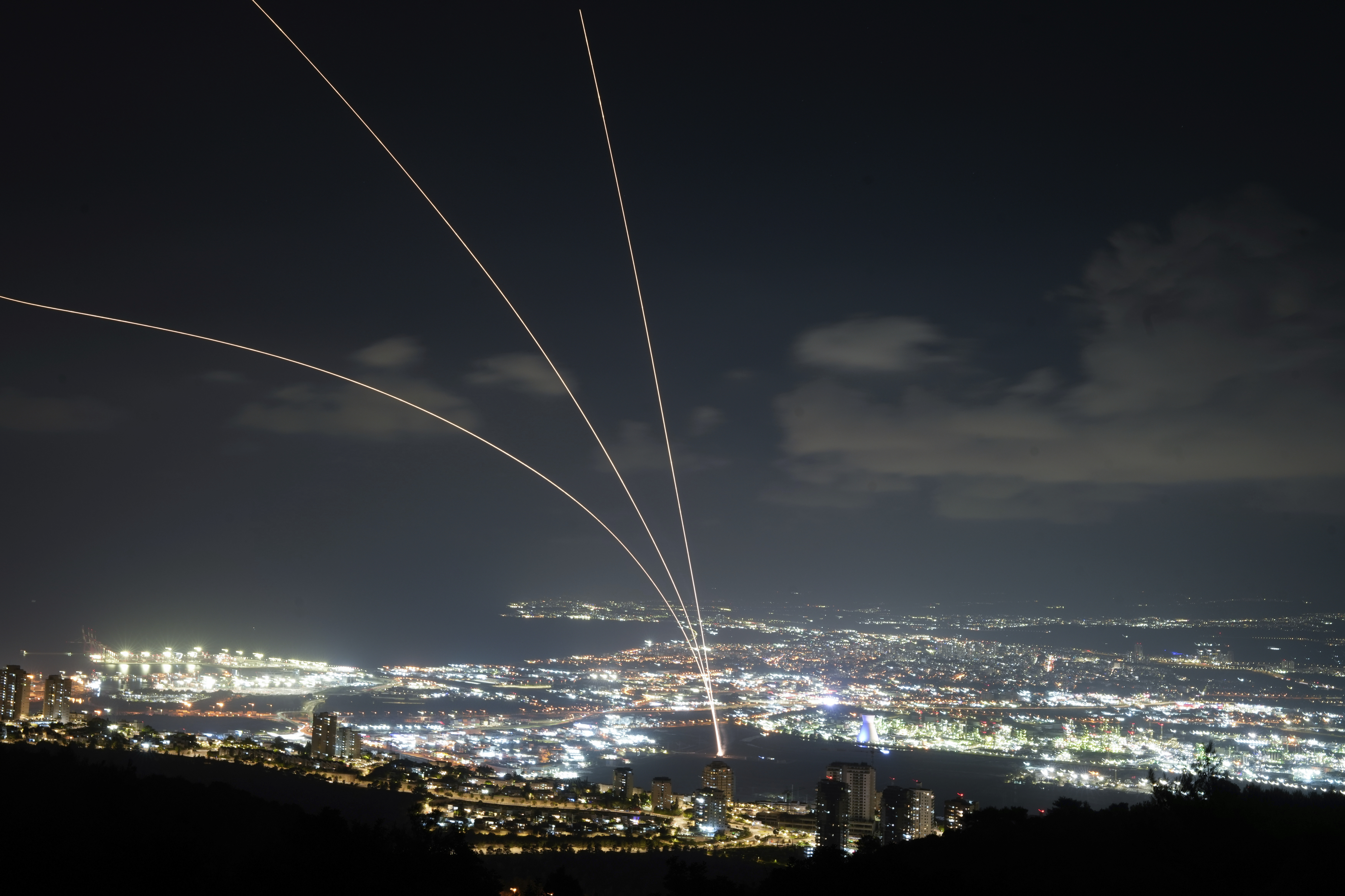 Israeli Iron Dome air defense system fires to intercept rockets that were launched from Lebanon, as seen from Haifa, northern Israel, Monday, Sept. 23, 2024. (AP Photo/Baz Ratner)