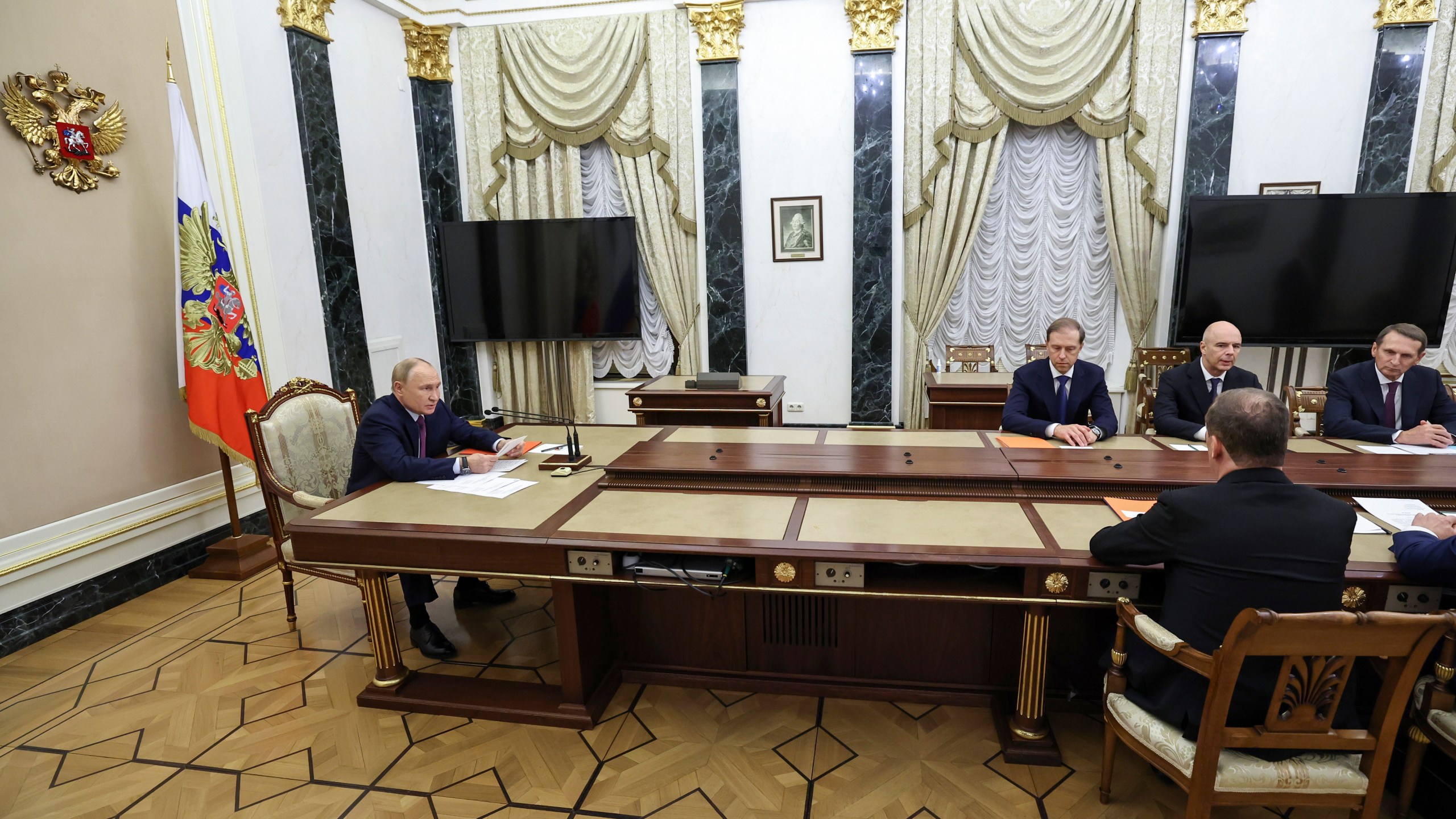 Russian President Vladimir Putin, left, speaks at the Security Council meeting on nuclear deterrence at the Kremlin in Moscow, Russia, Wednesday, Sept. 25, 2024. (Alexander Kazakov, Sputnik, Kremlin Pool Photo via AP)