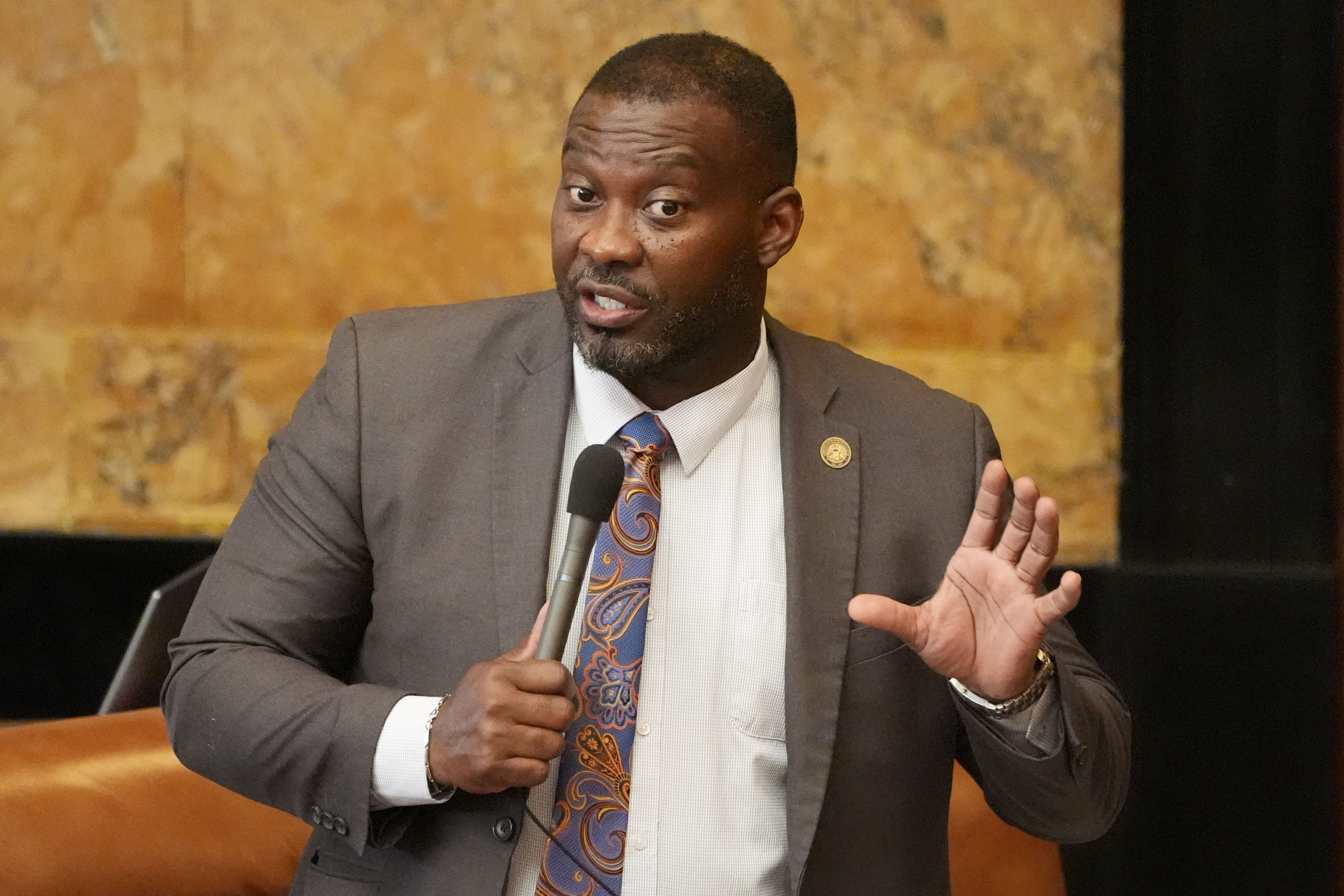 FILE - Mississippi State Rep. Bryant Clark, D-Pickens, asks a question of a committee chairman on the House Chamber floor during debate over a bill at the State Capitol in Jackson, Miss., March 26, 2024. (AP Photo/Rogelio V. Solis, File)