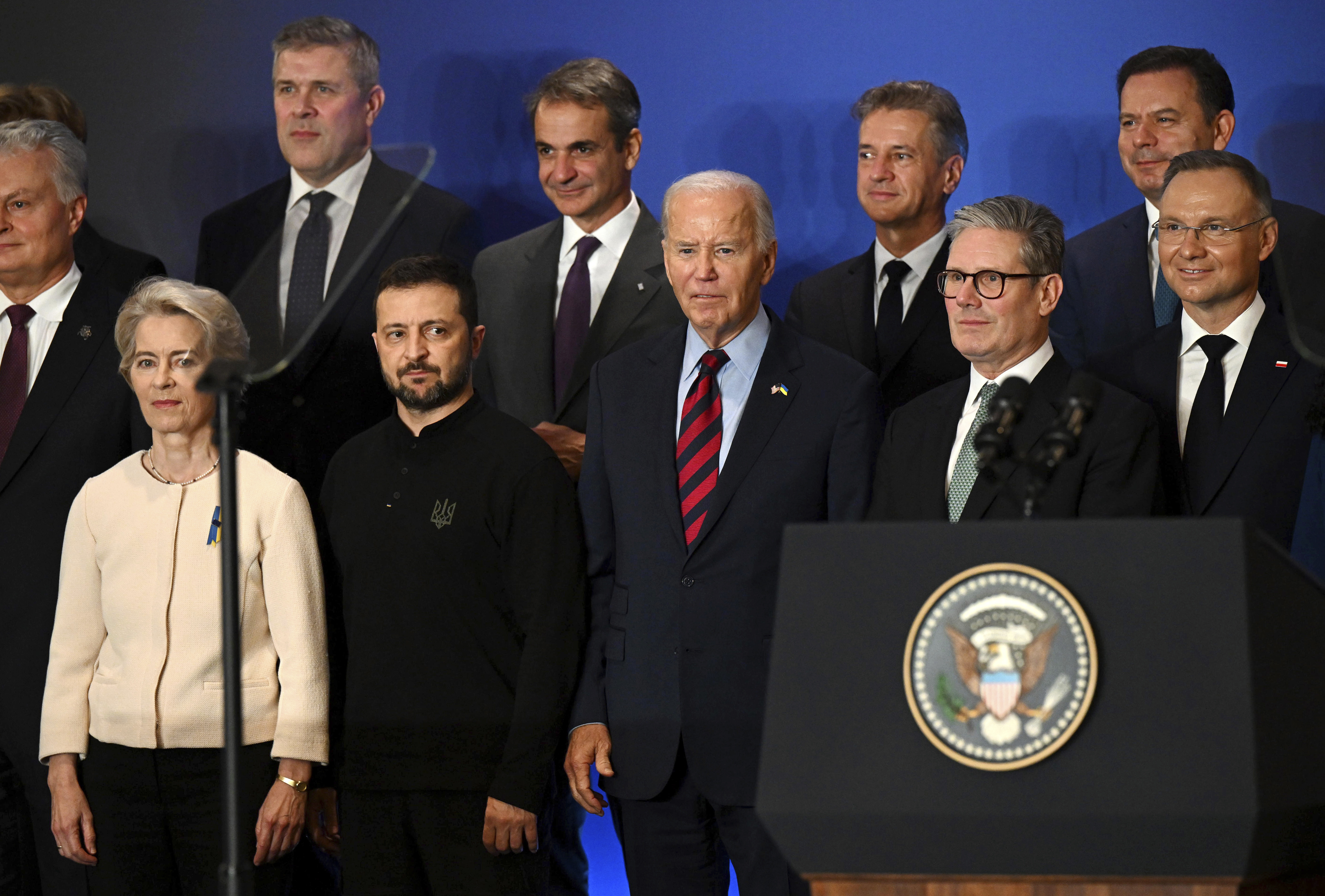 U.S. President Joe Biden, center, with Ukraine's President Volodymyr Zelenskyy, front second left, President of the European Commission Ursula von der Leyen, front left, Britain's Prime Minister Keir Starmer, front second right, President of Poland Andrzej Duda, right, and other world leaders pose for a family picture of the launching of a Joint Declaration of Support for Ukrainian Recovery and Reconstruction, Wednesday, Sept. 25, 2024, in New York. (Leon Neal/Pool Photo via AP)