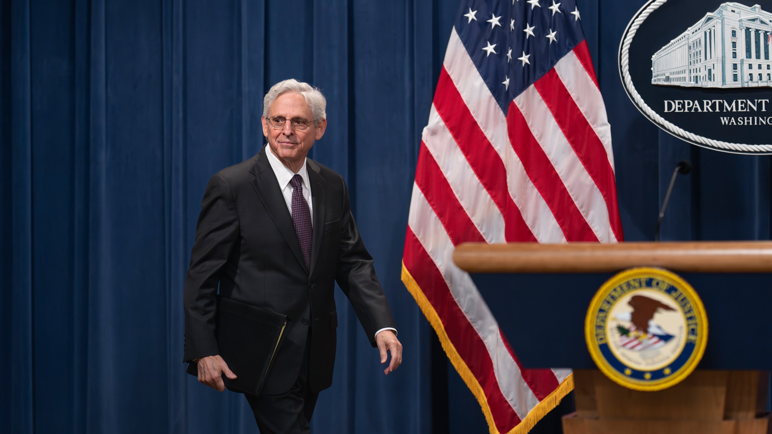 Attorney General Merrick Garland arrives for a news conference as the Justice Department announced criminal charges against Iranian operatives suspected of hacking Donald Trump's presidential campaign and disseminating stolen information to media organizations, at the Justice Department in Washington, Friday, Sept. 27, 2024. (AP Photo/J. Scott Applewhite)