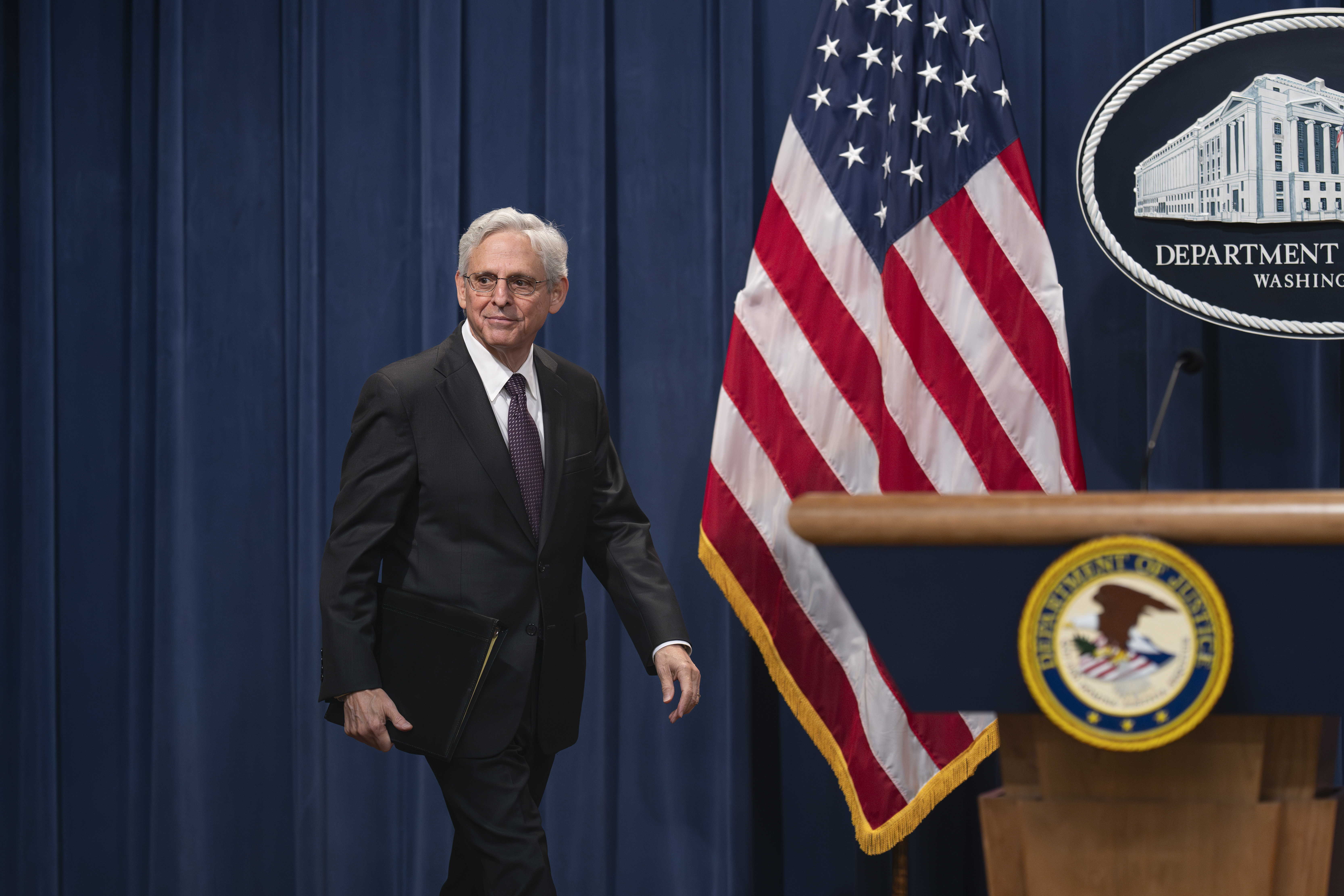 Attorney General Merrick Garland arrives for a news conference as the Justice Department announced criminal charges against Iranian operatives suspected of hacking Donald Trump's presidential campaign and disseminating stolen information to media organizations, at the Justice Department in Washington, Friday, Sept. 27, 2024. (AP Photo/J. Scott Applewhite)