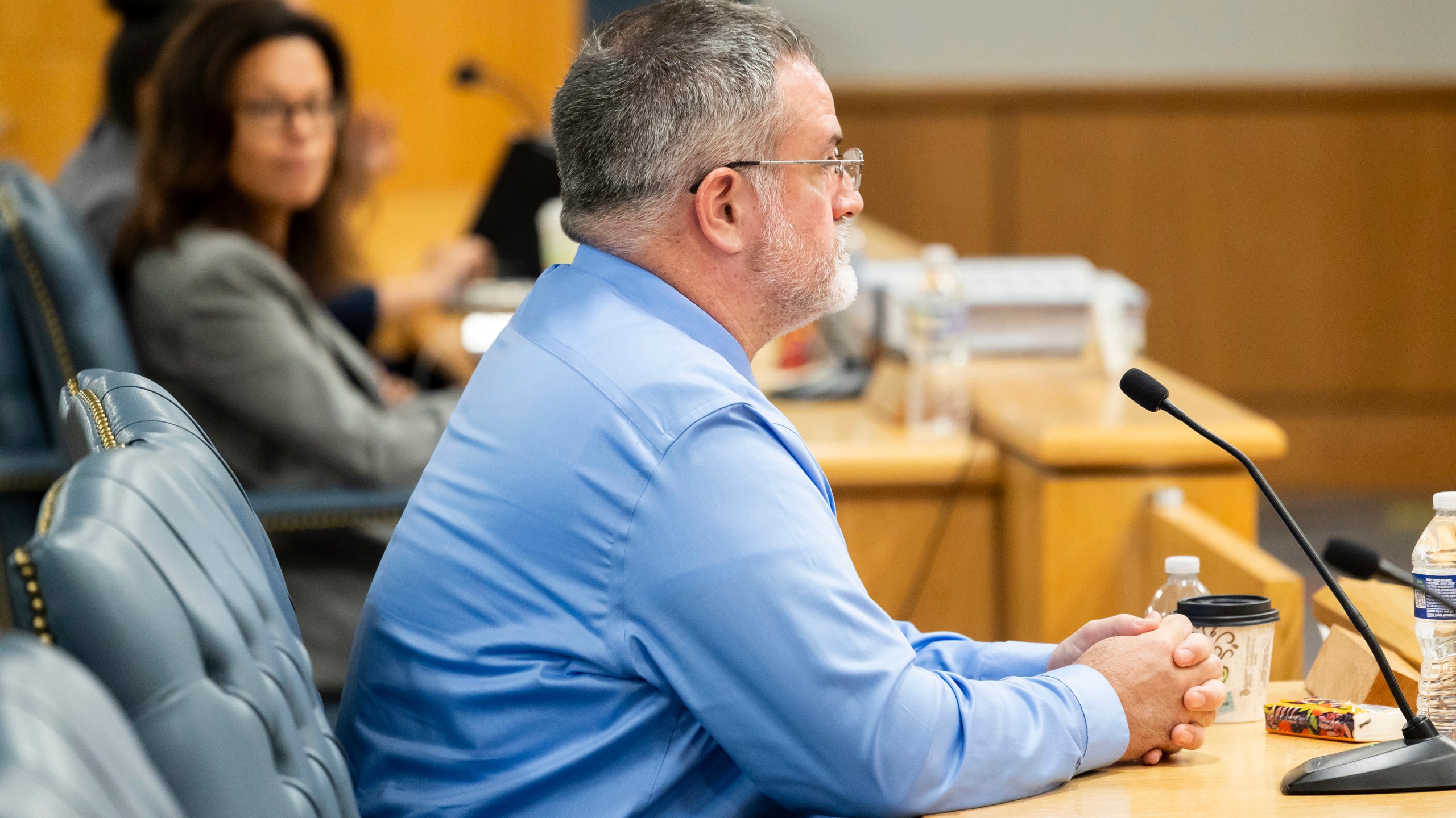 Matthew McCoy, a former OceanGate employee, listens to questions from the investigative board during the final day of the Coast Guard investigatory hearing on the causes of the implosion of an experimental submersible headed for the wreck of the Titanic, Friday, Sept. 27, 2024, in North Charleston, S.C. (AP Photo/Mic Smith)