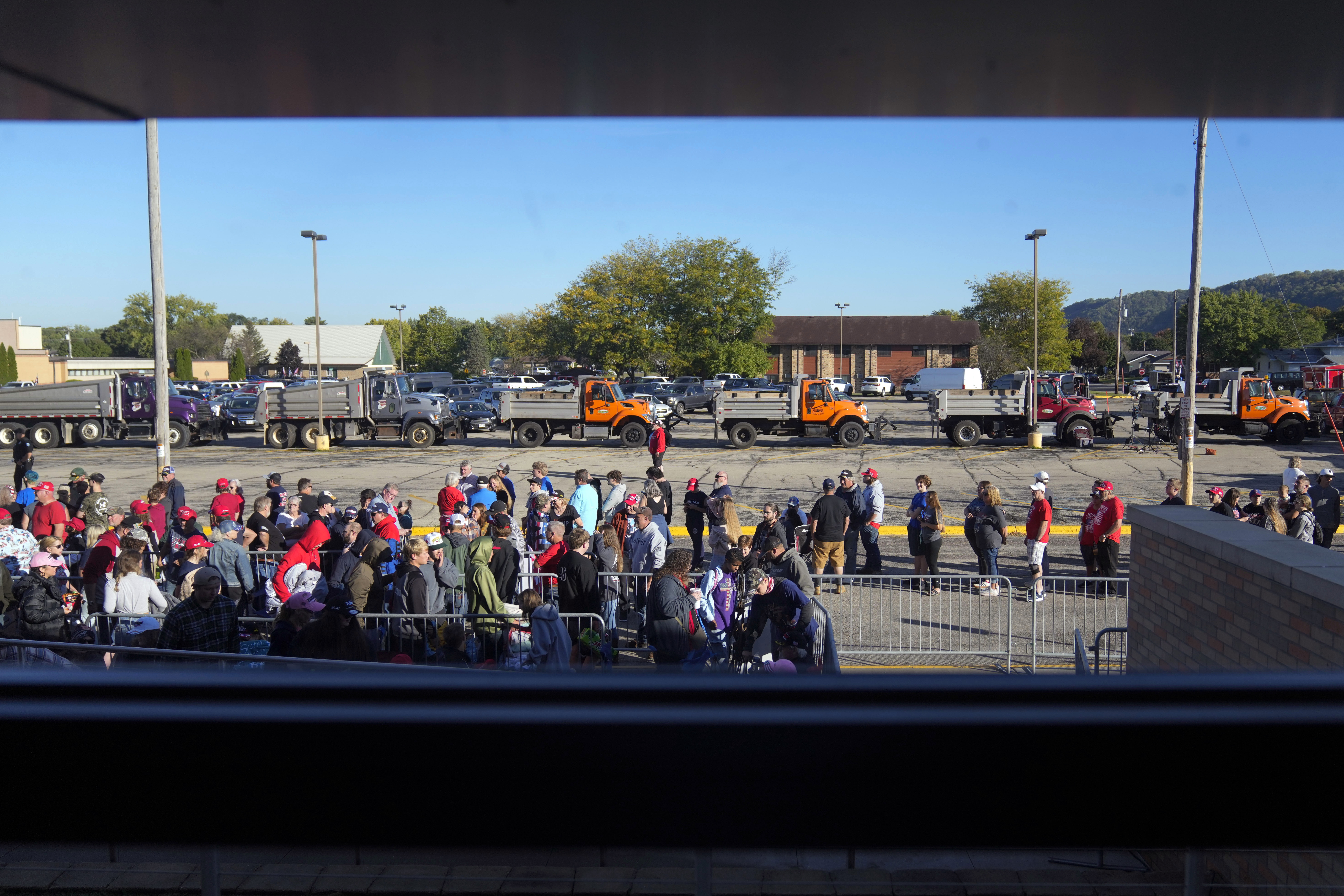 Supporters wait for Republican presidential nominee former President Donald Trump to arrive at a rally, Saturday, Sept. 28, 2024, in Prairie du Chien, Wis. (AP Photo/Charlie Neibergall)