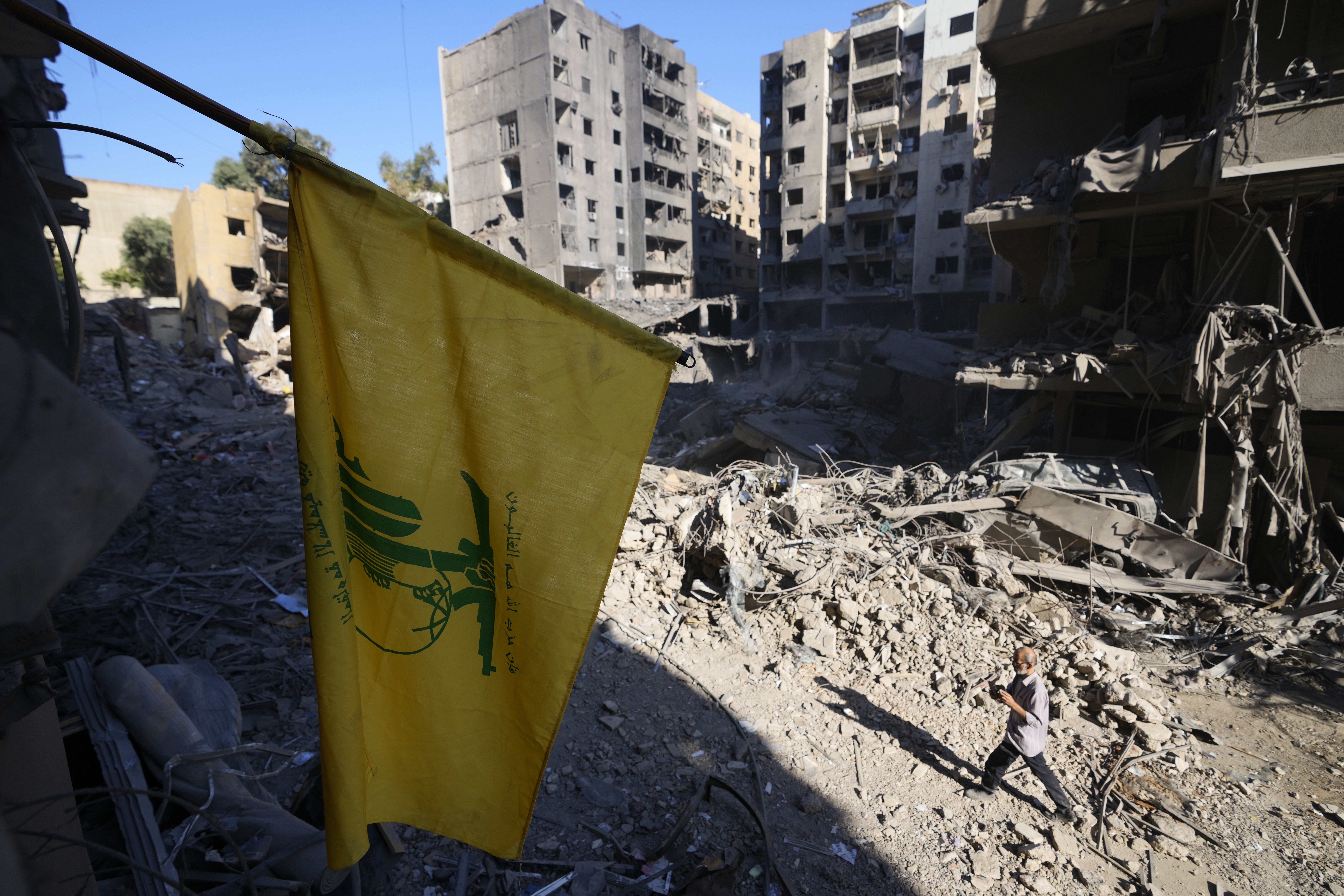 A Hezbollah flag at the site of the assassination of Hezbollah leader Hassan Nasrallah in Beirut's southern suburbs, Sunday, Sept. 29, 2024. (AP Photo/Hassan Ammar)