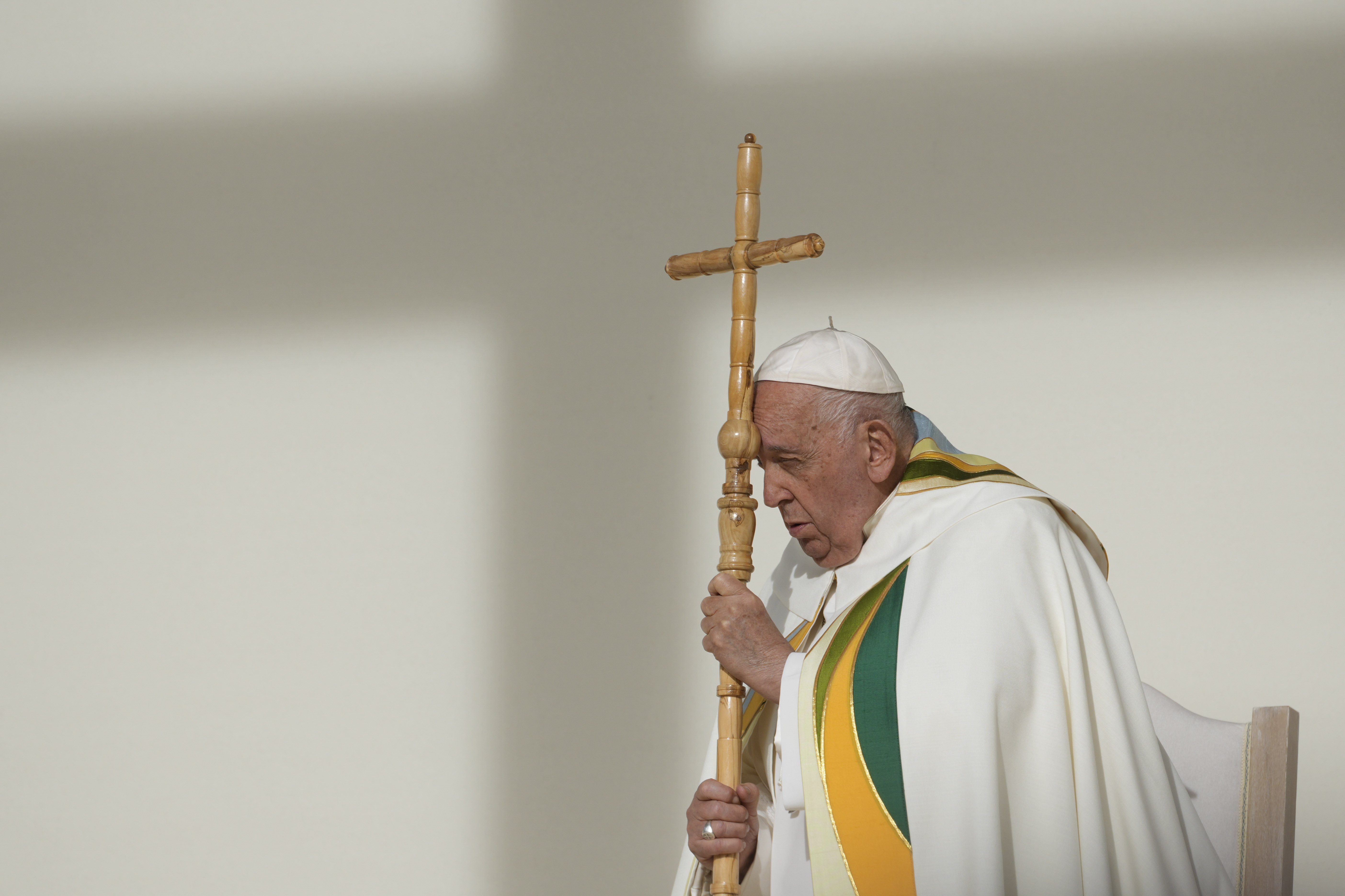 Pope Francis holds the pastoral staff as he presides over the Sunday mass at King Baudouin Stadium, in Brussels Sunday, Sept. 29, 2024. (AP Photo/Andrew Medichini)