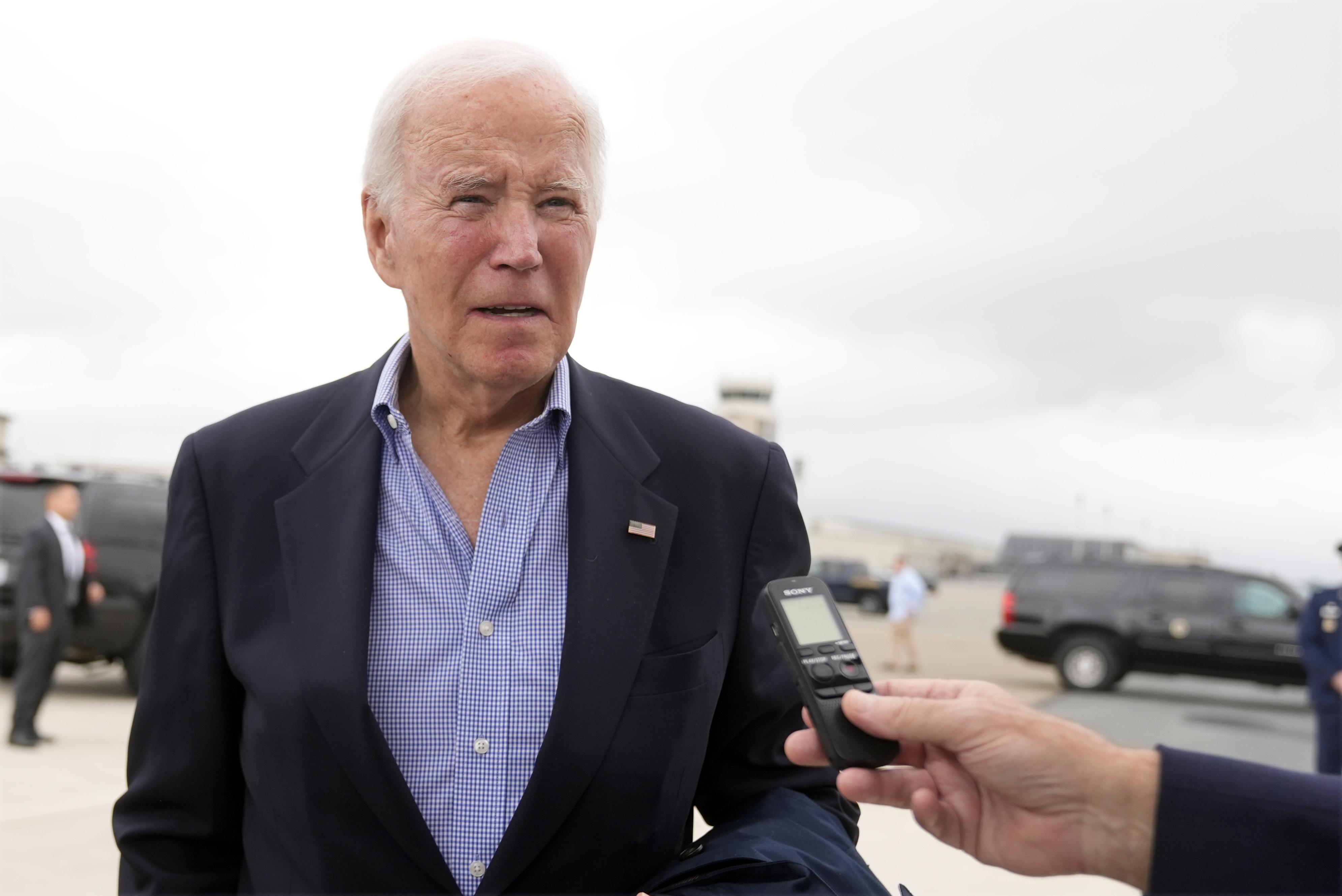 President Joe Biden speaks to reporters before boarding Air Force One at Dover Air Force Base, in Dover, Del., Sunday, Sept. 29, 2024, to return to Washington. (AP Photo/Manuel Balce Ceneta)