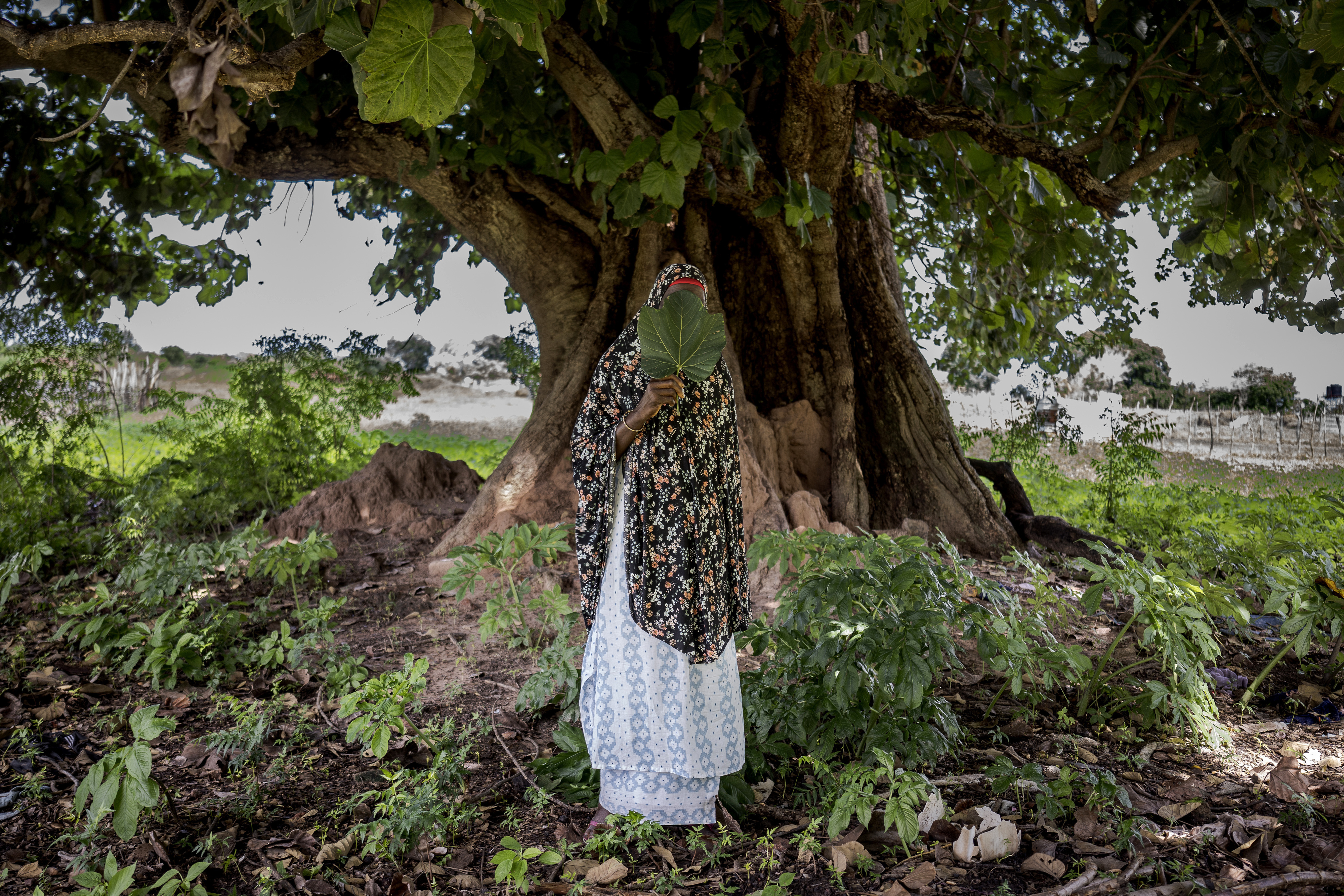 FILE - Fatoumatta,, a survivor of female genital mutilation, poses for a photograph in the village of Sintet, Gambia, Friday, July. 26, 2024. (AP Photo/Annika Hammerschlag, File)