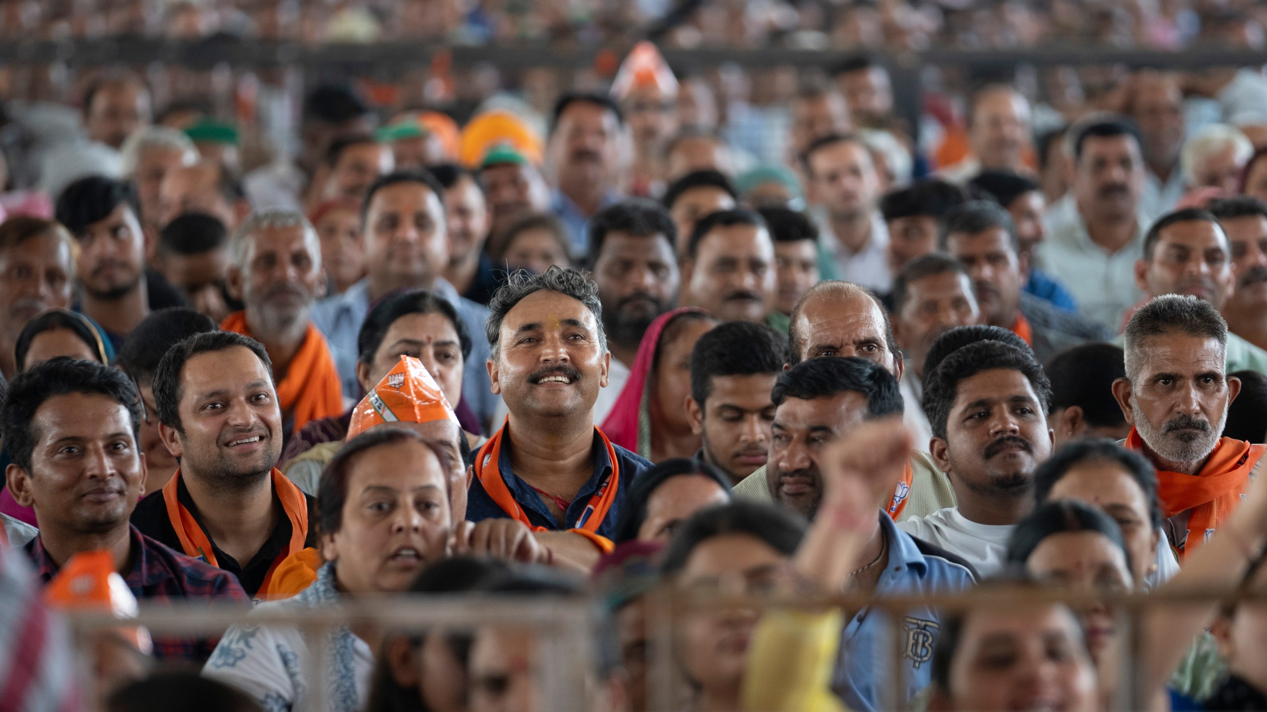 FILE- Bharatiya Janata Party (BJP) supporters listen as their Indian Prime Minister Narendra Modi speaks during a campaign rally of Jammu and Kashmir Assembly elections in Jammu, India, Saturday, Sept. 28, 2024. (AP Photo/Channi Anand, File)