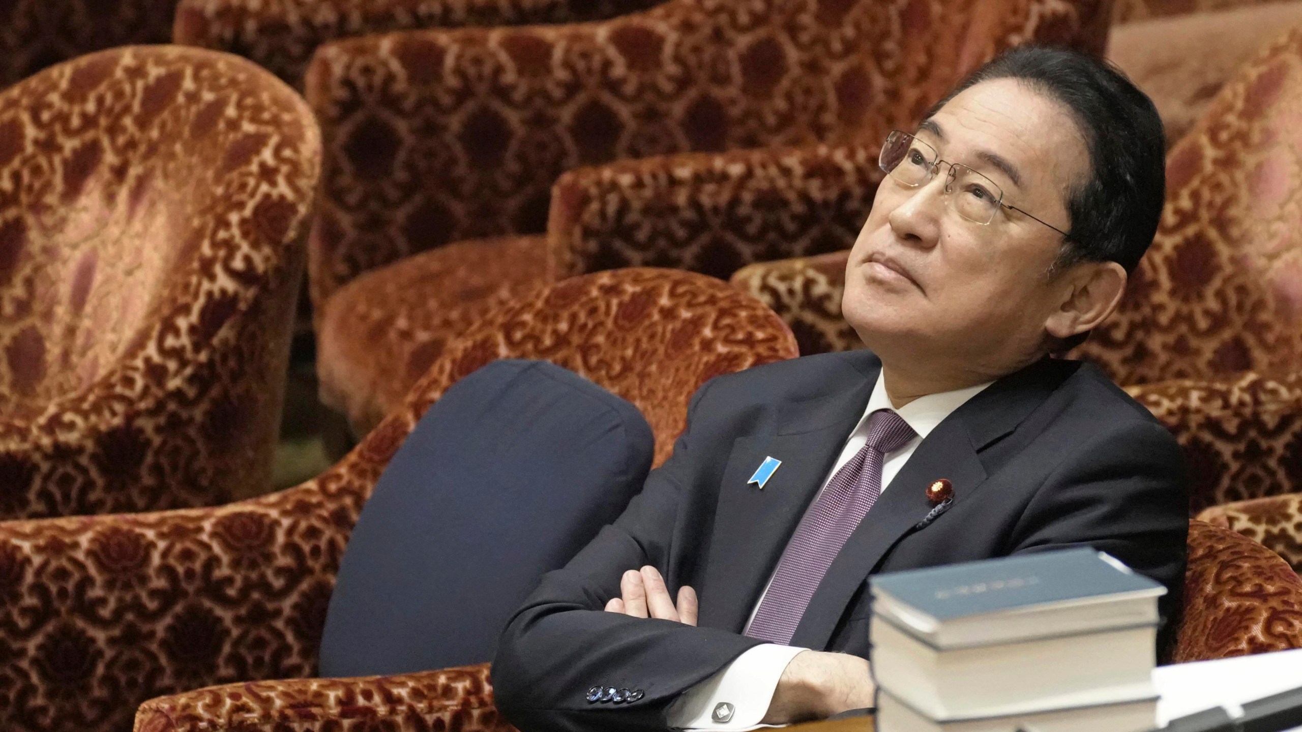 FILE - Japan's Prime Minister Fumio Kishida waits for the start of a budget committee's meeting in Tokyo on March 1, 2024, where two former cabinet ministers belonging to Japan's governing party's key faction behind a major corruption scandal that has rocked the government renewed denial they had any role in running slush funds. (Kyodo News via AP, File)