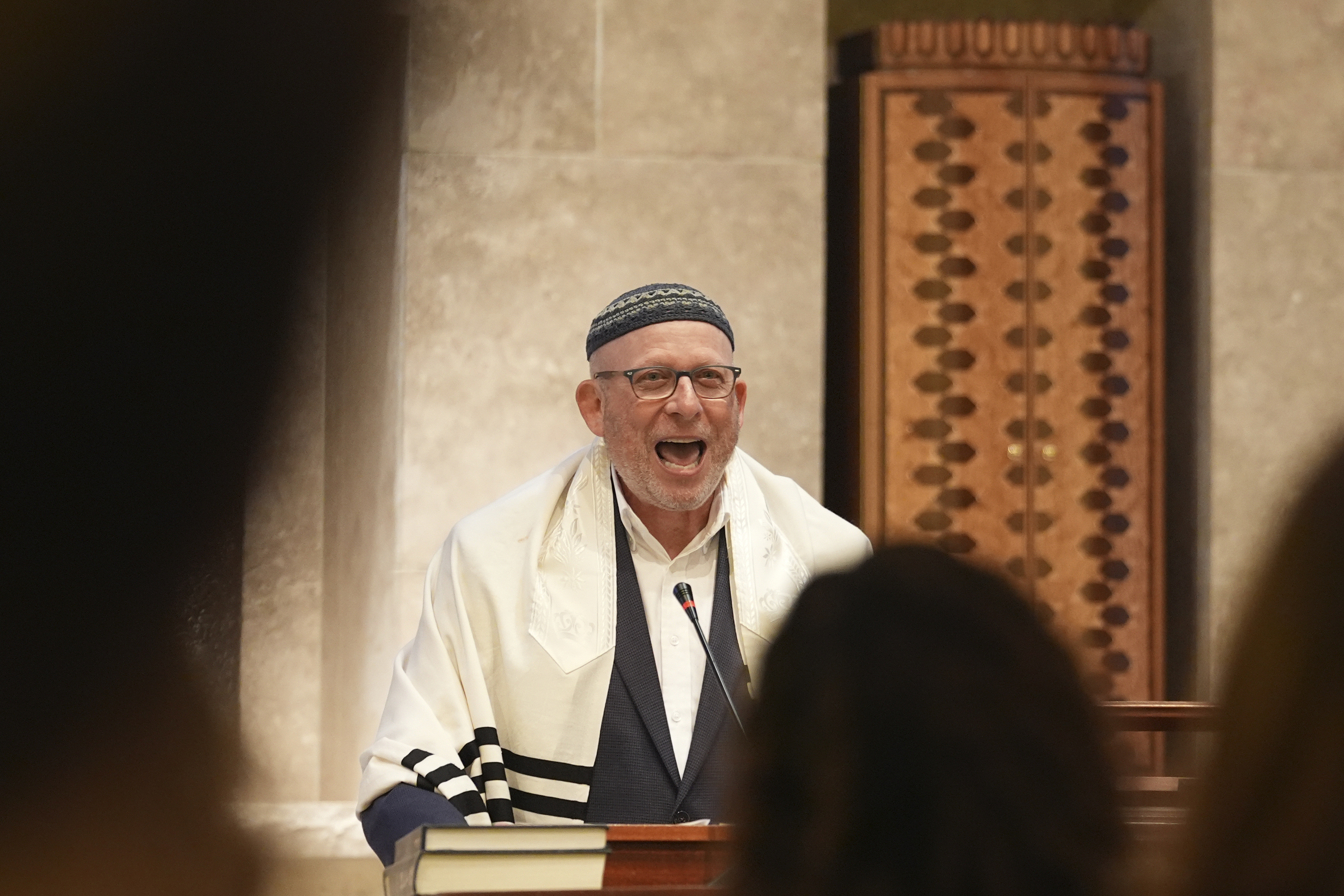 Rabbi Robert A. Davis speaks during a Shabbat service, Friday, Sept. 27, 2024, at Temple Beth Sholom in Miami Beach, Fla. (AP Photo/Wilfredo Lee)