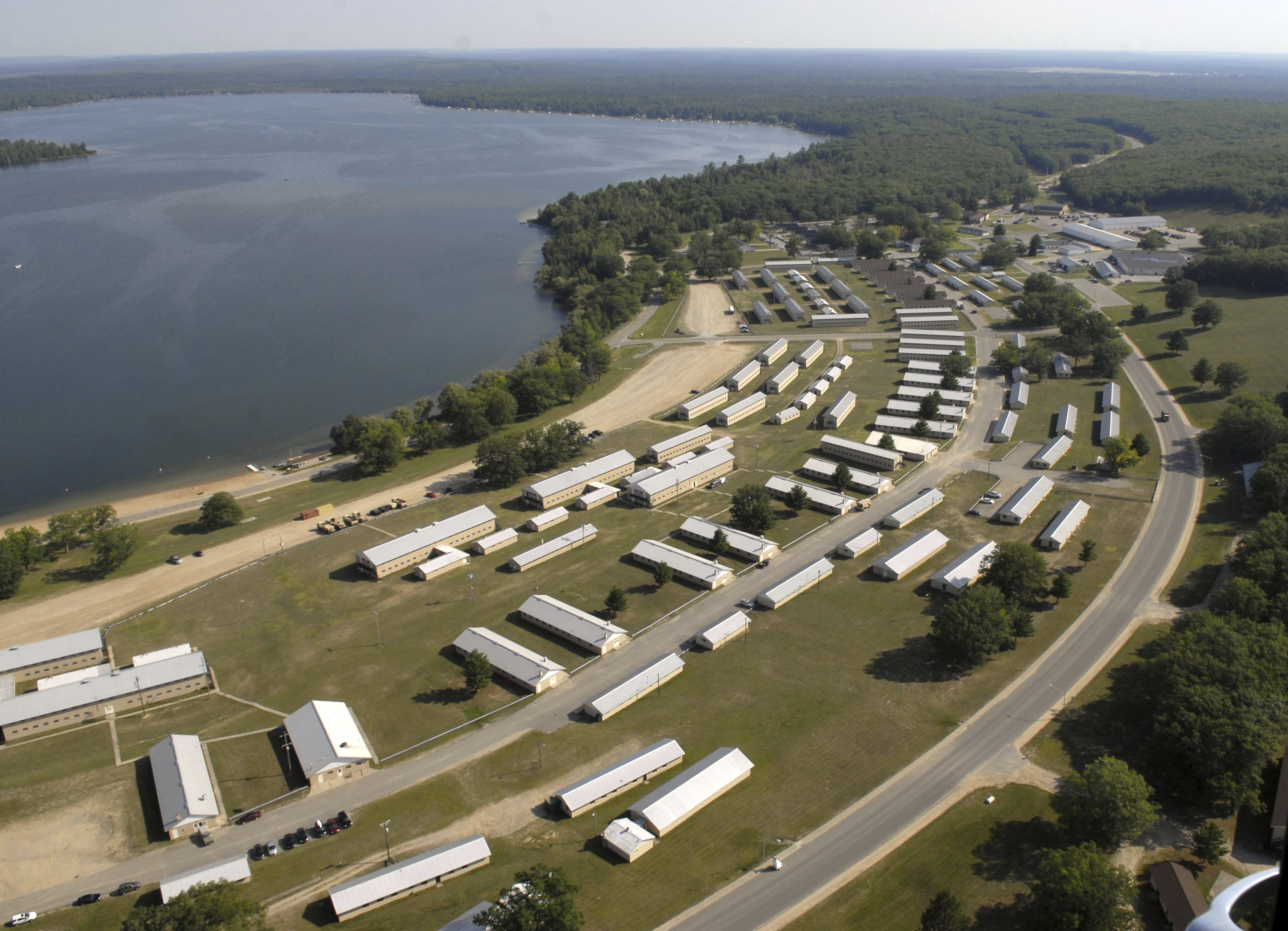 FILE - This photo shows an aerial view of Camp Grayling Joint Maneuver Training Center in Grayling, Mich., July 19, 2014. (AP Photo/John L. Russell, File)