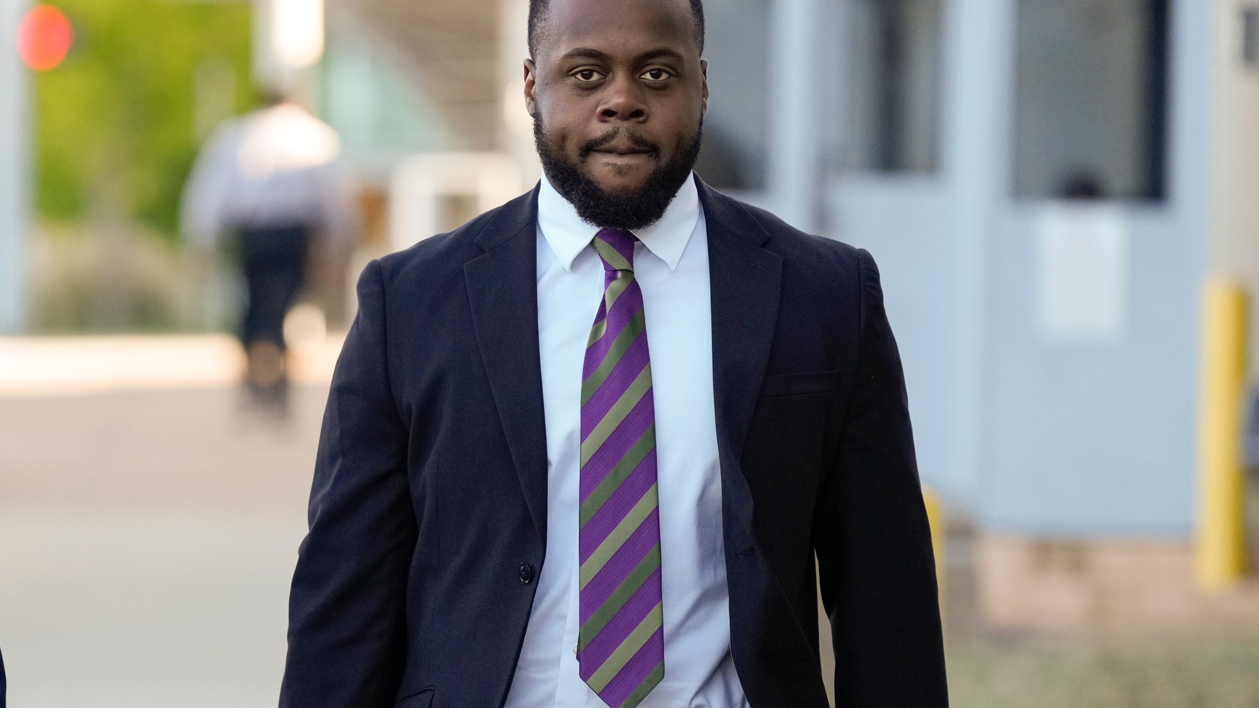 Tadarrius Bean one of three former Memphis police officers charged in the 2023 fatal beating of Tyre Nichols, arrives at the federal courthouse for the day's proceedings Wednesday, Oct. 2, 2024, in Memphis, Tenn. (AP Photo/George Walker IV)