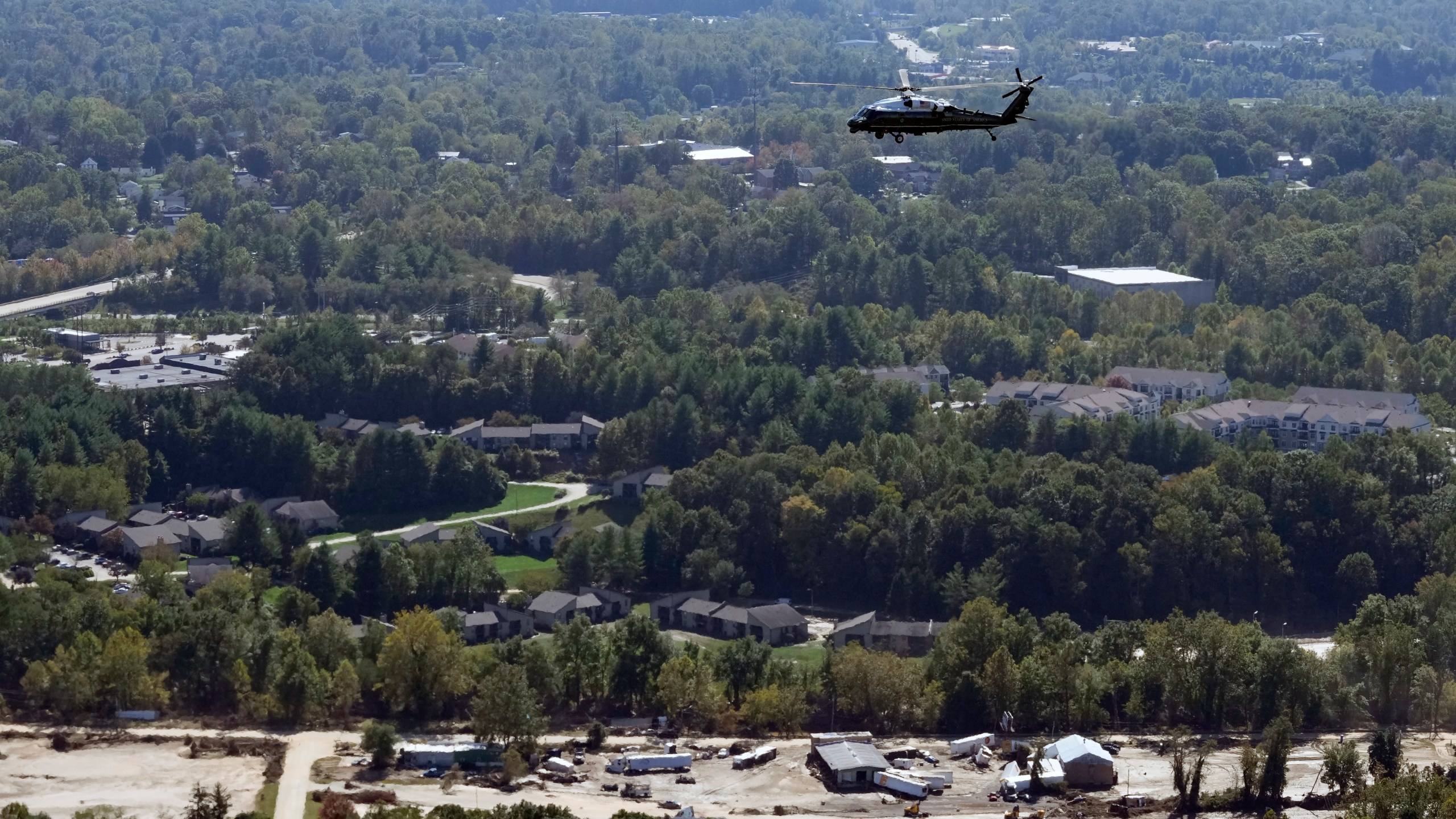 Marine One, with President Joe Biden on board, flies around areas impacted by Hurricane Helene over Asheville, N.C., Wednesday, Oct. 2, 2024. (AP Photo/Susan Walsh) (AP Photo/Susan Walsh)