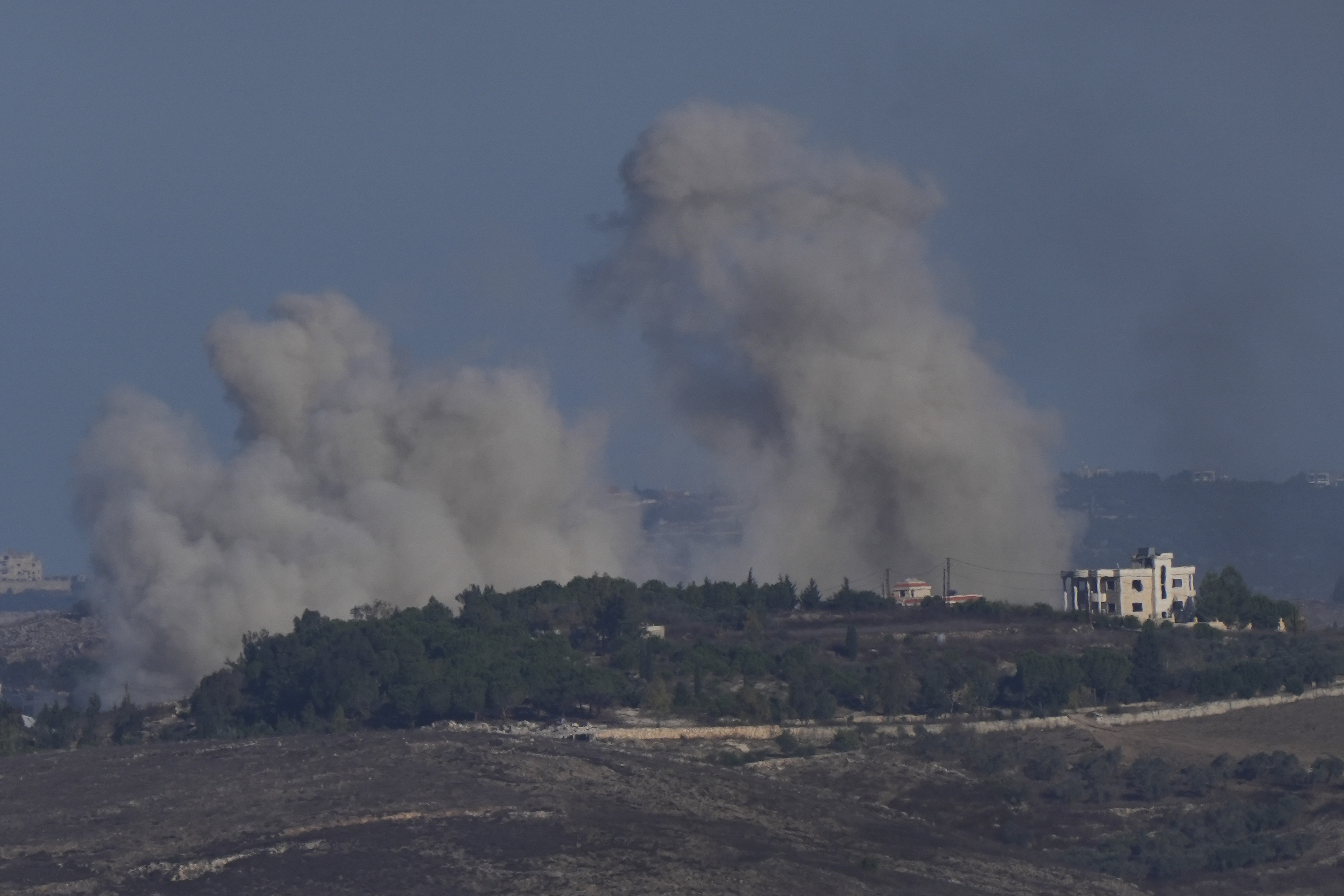 Smoke rises following Israeli bombardment in southern Lebanon as seen from northern Israel, Thursday, Oct. 3, 2024. (AP Photo/Baz Ratner)