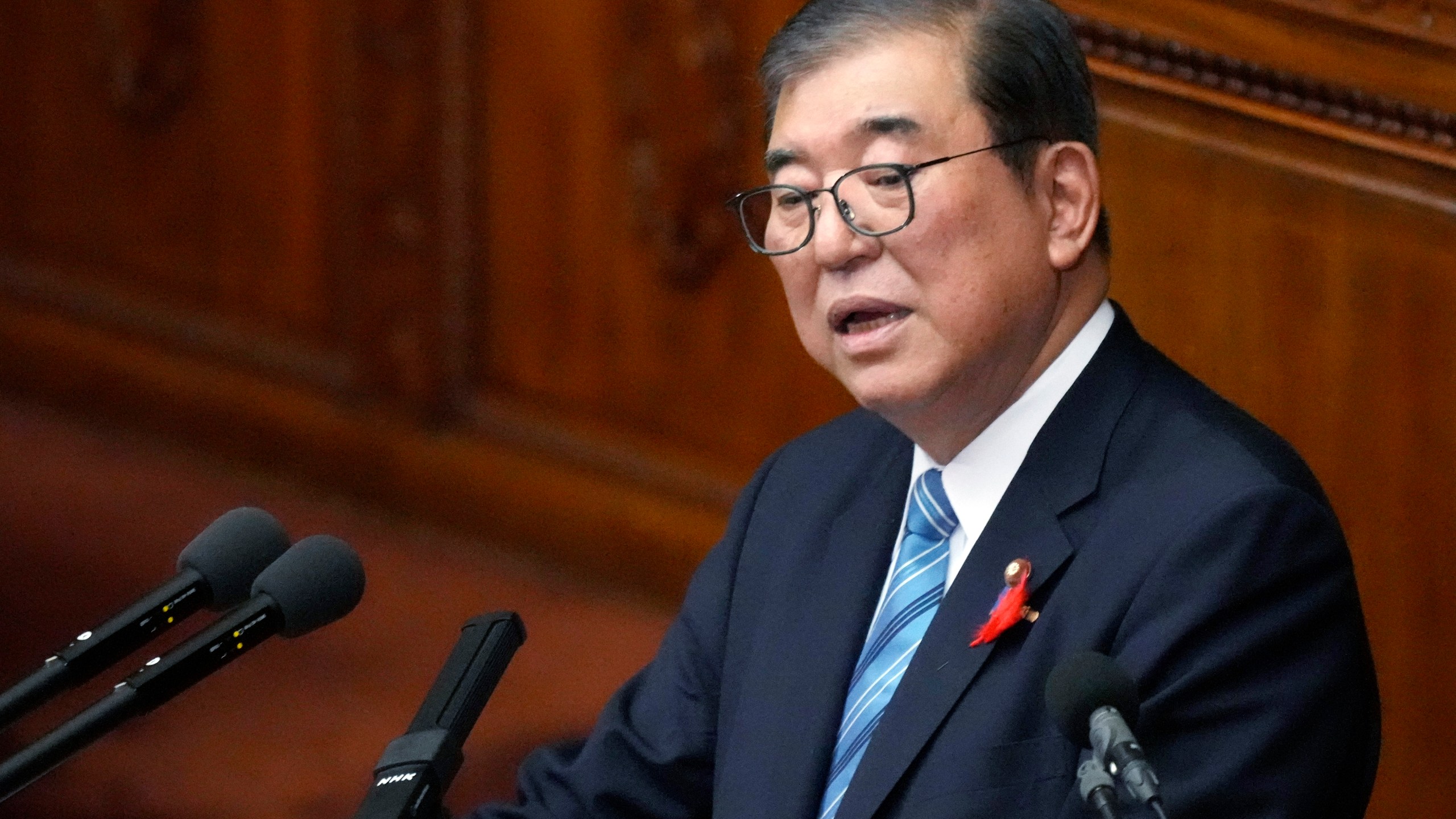 Japanese Prime Minister Shigeru Ishiba delivers his first policy speech during a Diet session at the Lower House of the Parliament Friday, Oct. 4, 2024, in Tokyo. (AP Photo/Eugene Hoshiko)