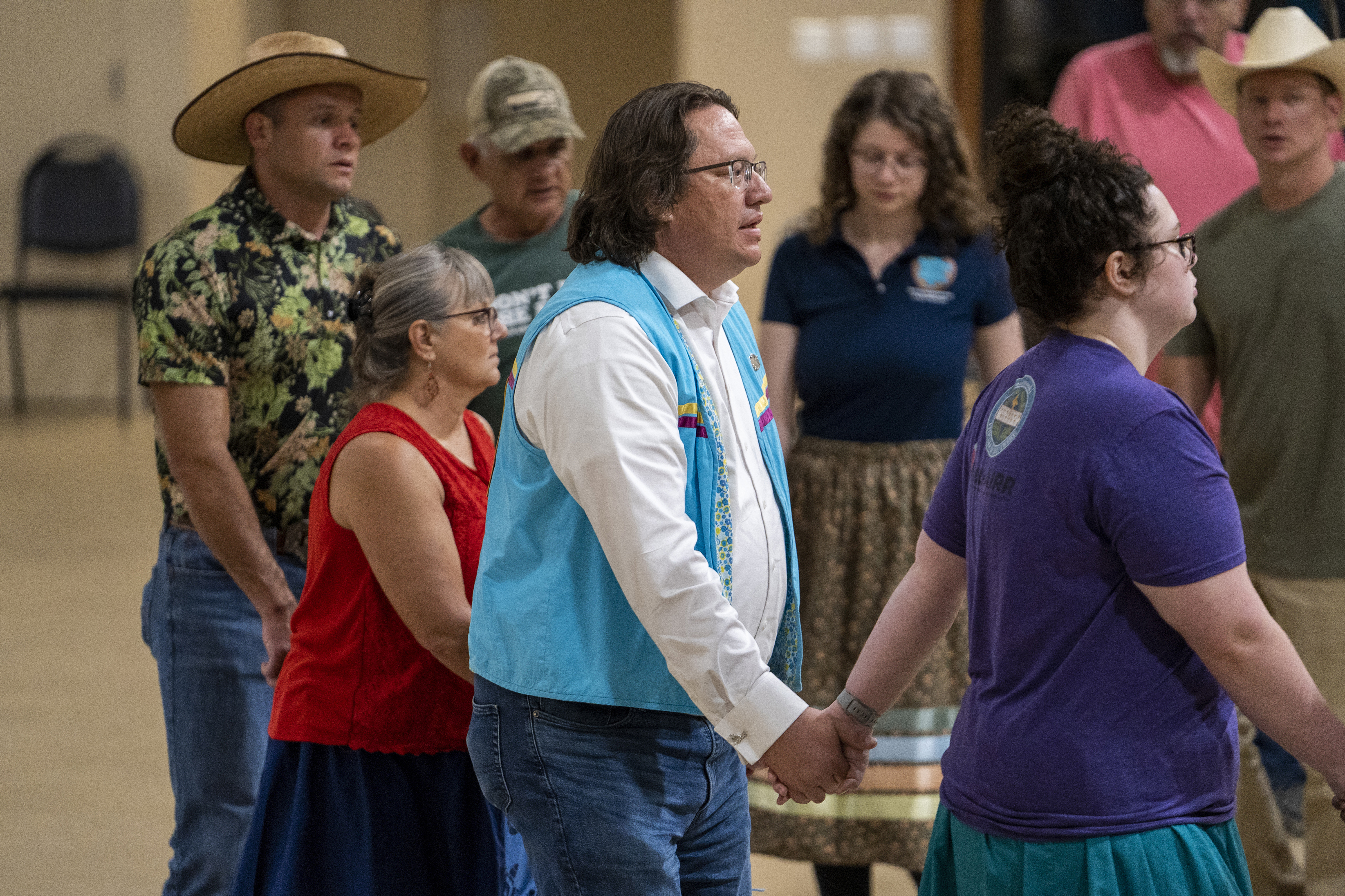 Chief Ben Barnes of the Shawnee Tribe participates in a stomp dance on Friday, September 20, 2024 in Miami, Okla.. (AP Photo/Nick Oxford)