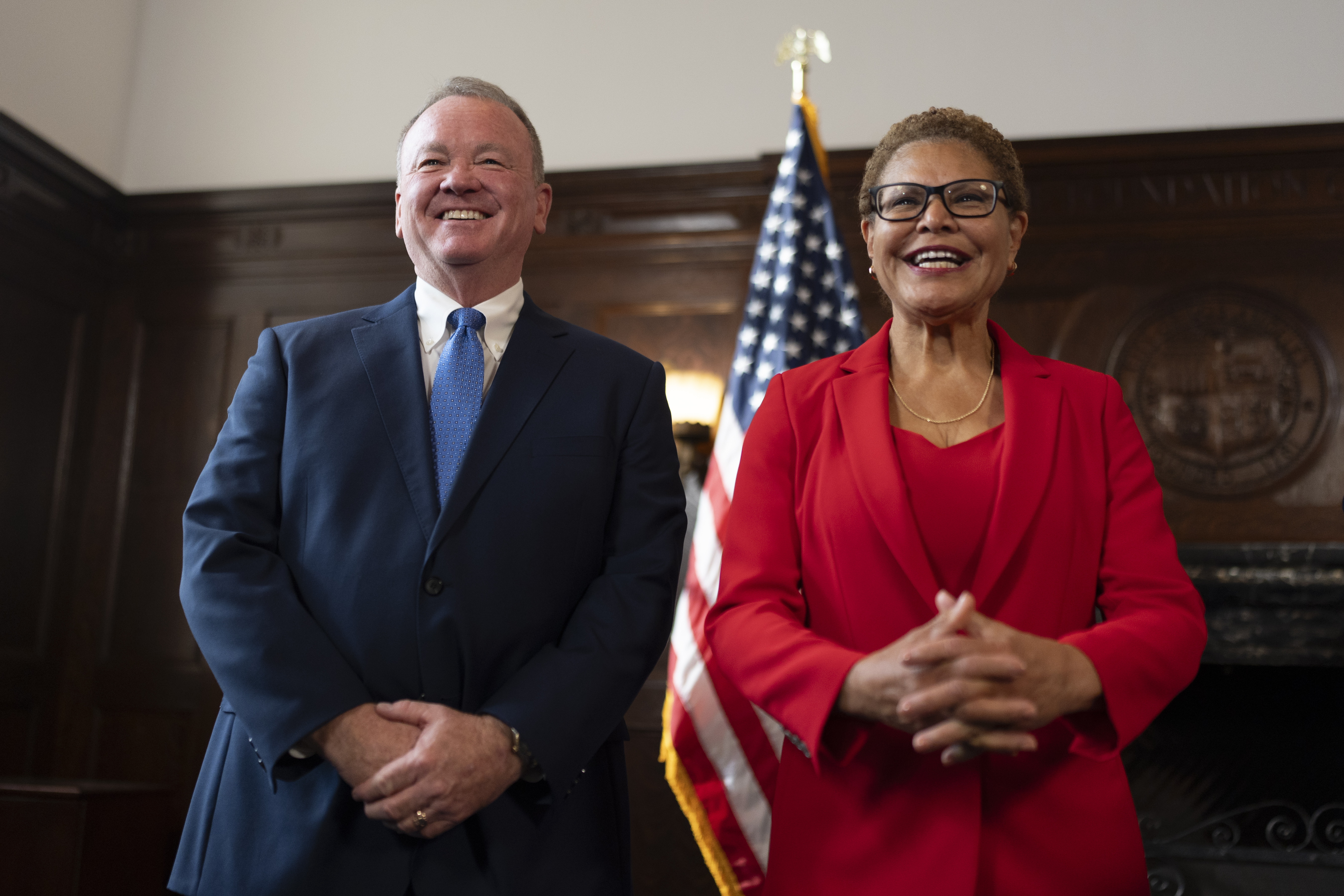 Los Angeles Mayor Karen Bass, right, and newly appointed police chief Jim McDonnell share a light moment during a news conference in Los Angeles, Friday, Oct. 4, 2024. (AP Photo/Jae C. Hong)