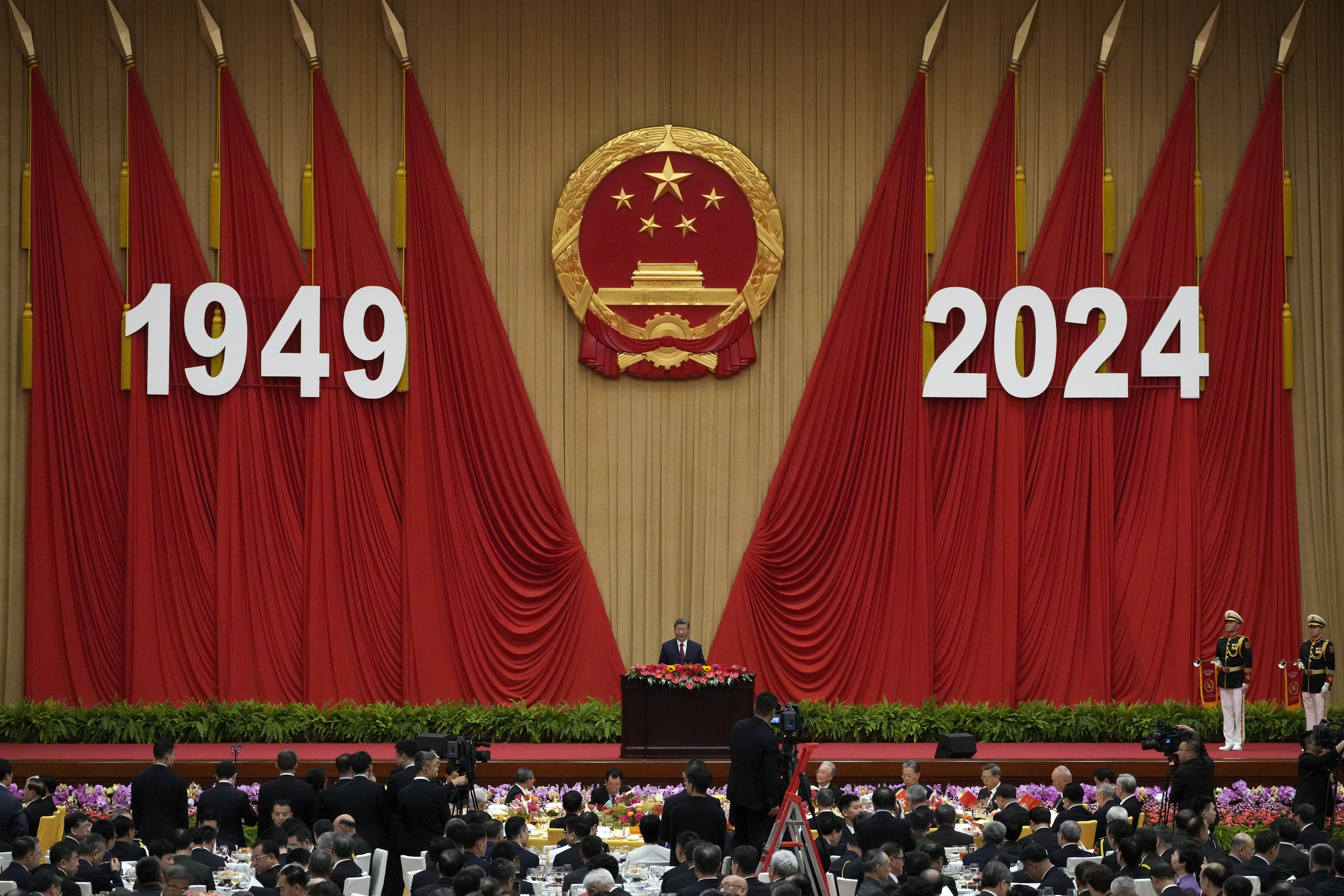 Chinese President Xi Jinping delivers his speech at a dinner marking the 75th anniversary of the founding of the People's Republic of China, at the Great Hall of the People in Beijing, Monday, Sept. 30, 2024. (AP Photo/Andy Wong)