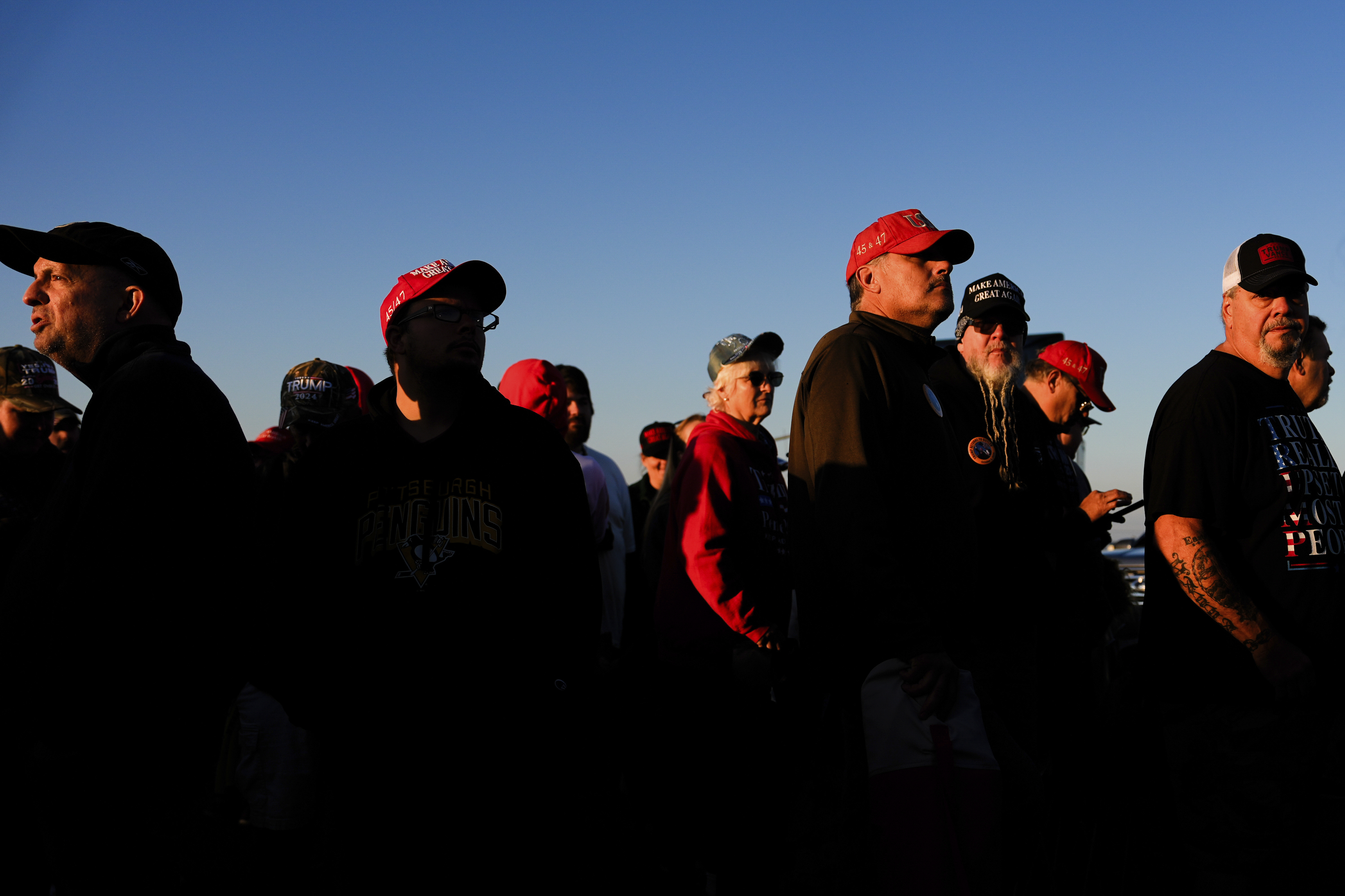 Supporters of Republican presidential nominee former President Donald Trump wait to enter a campaign rally at the Butler Farm Show, Saturday, Oct. 5, 2024, in Butler, Pa. (AP Photo/Julia Demaree Nikhinson)