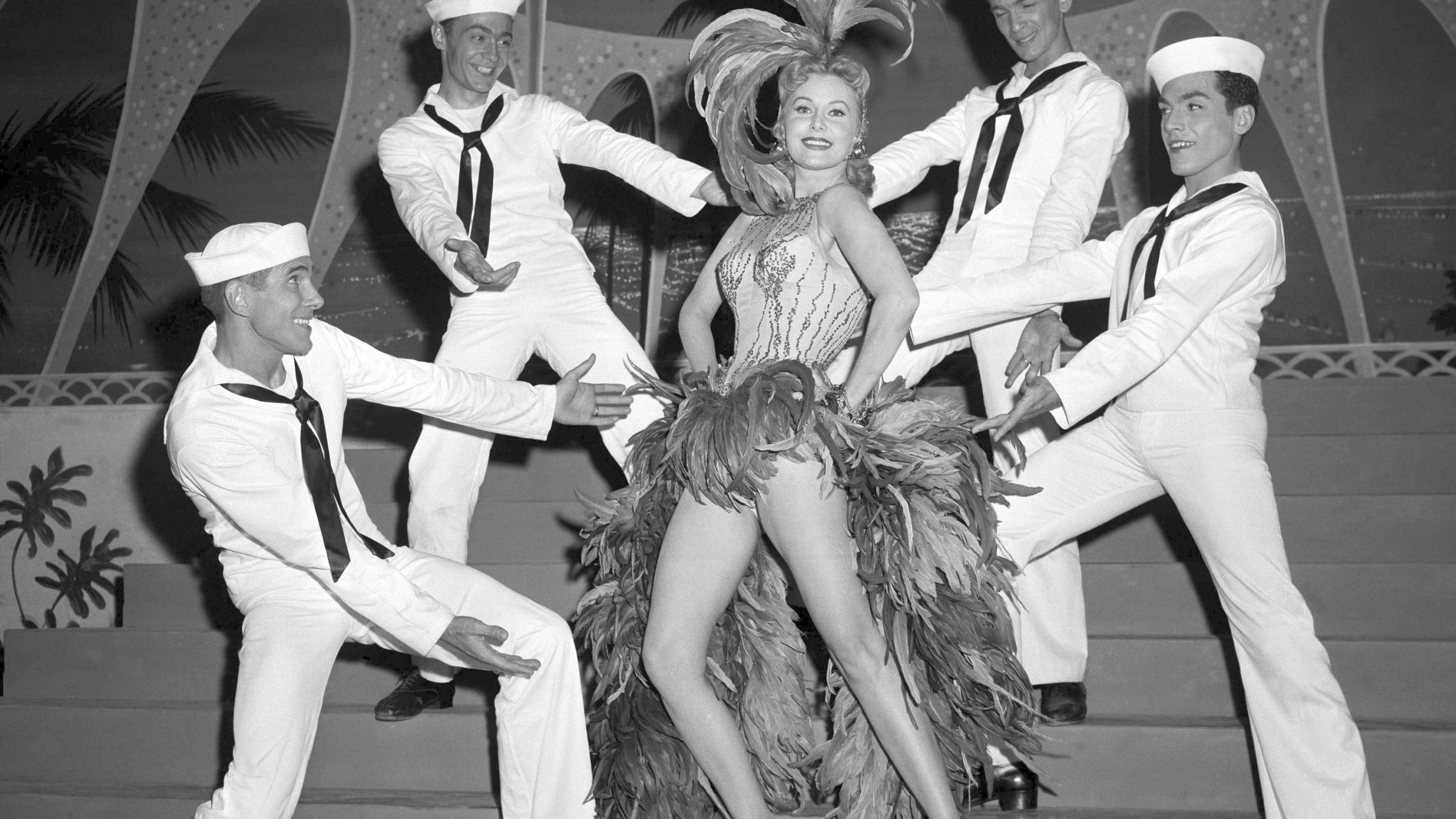 FILE - Actress Rhonda Fleming blossoms out as a singer and dancer in the first night club appearance of her career at the New Tropicana hotel, on May 20, 1957, in Las Vegas. (AP Photo/David Smith, File)