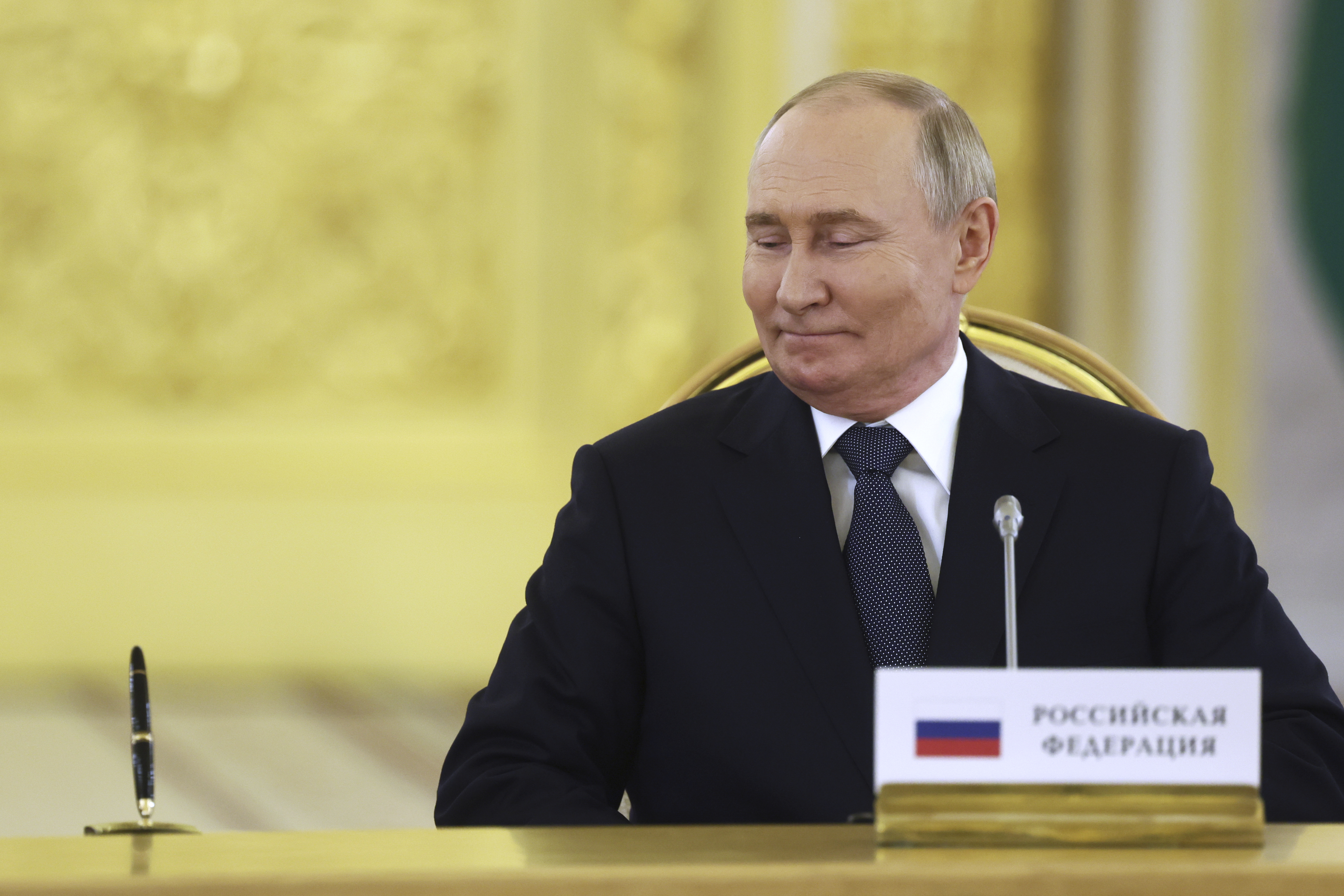 Russian President Vladimir Putin attends an extended meeting during the summit of the heads of state of the Commonwealth of Independent States (CIS) at the Kremlin in Moscow, Russia, Tuesday, Oct. 8, 2024. (Sergei Ilnitsky/Pool Photo via AP)