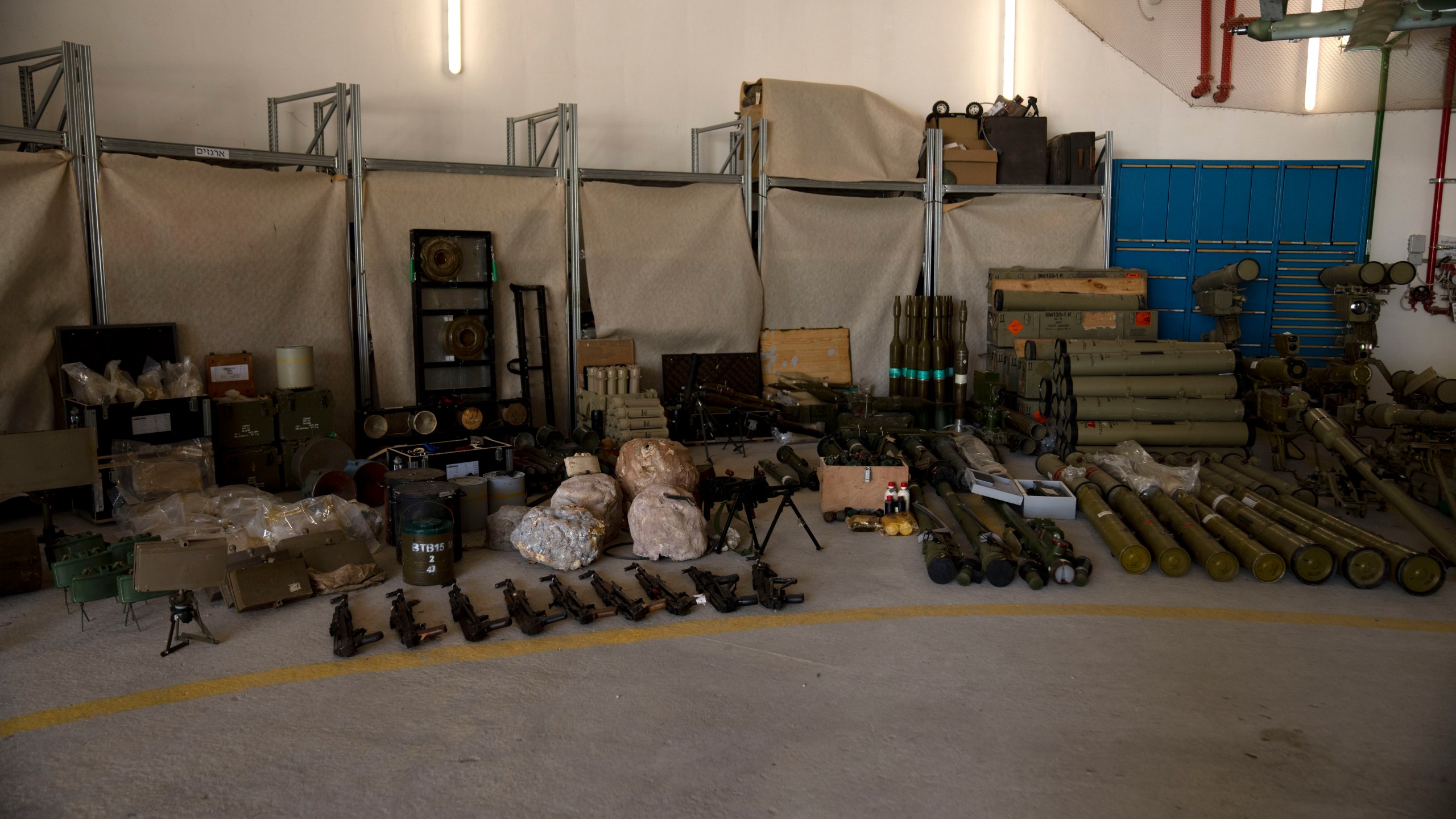 Weapons used by Hezbollah seized during combat operations in Lebanon are displayed during a government-organized media tour on a base in southern Israel, Wednesday, Oct. 9, 2024. (AP Photo/Maya Alleruzzo)