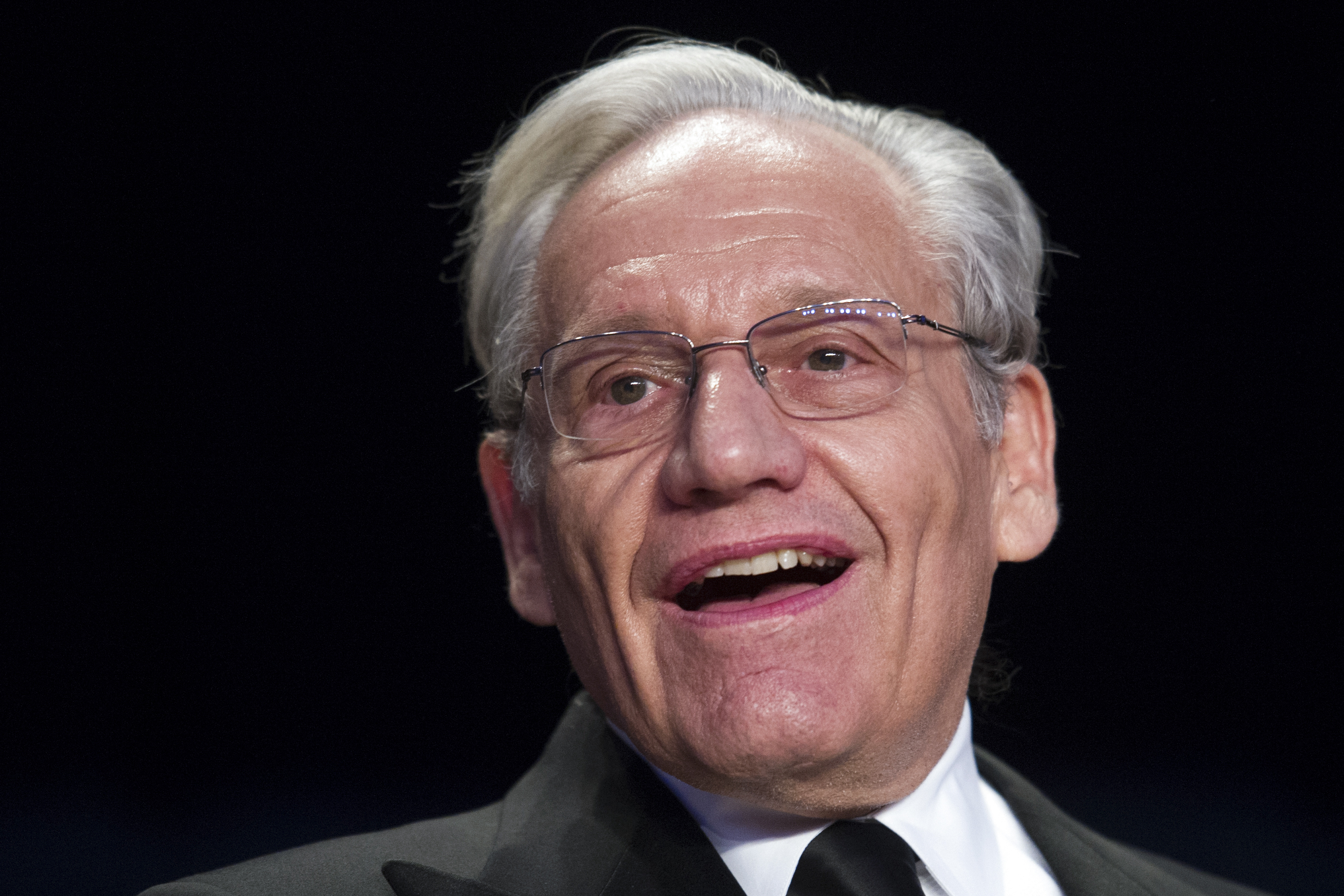 FILE - In this April 29, 2017, file photo journalist Bob Woodward sits at the head table during the White House Correspondents' Dinner in Washington. (AP Photo/Cliff Owen, File)