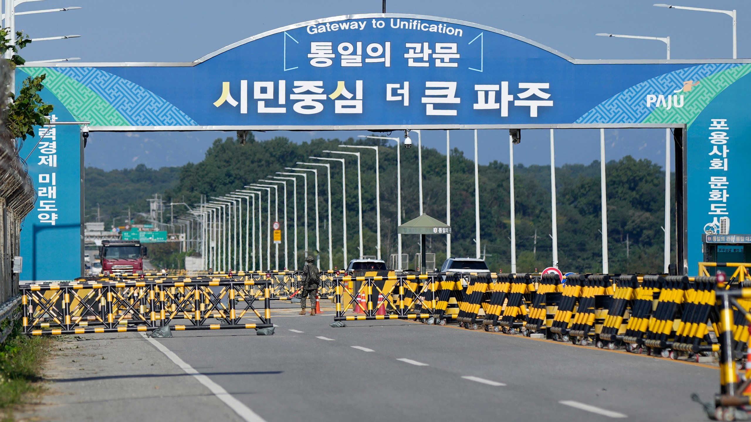 Barricades are placed near the Unification Bridge, which leads to the Panmunjom in the Demilitarized Zone in Paju, South Korea, Wednesday, Oct. 9, 2024. (AP Photo/Lee Jin-man)