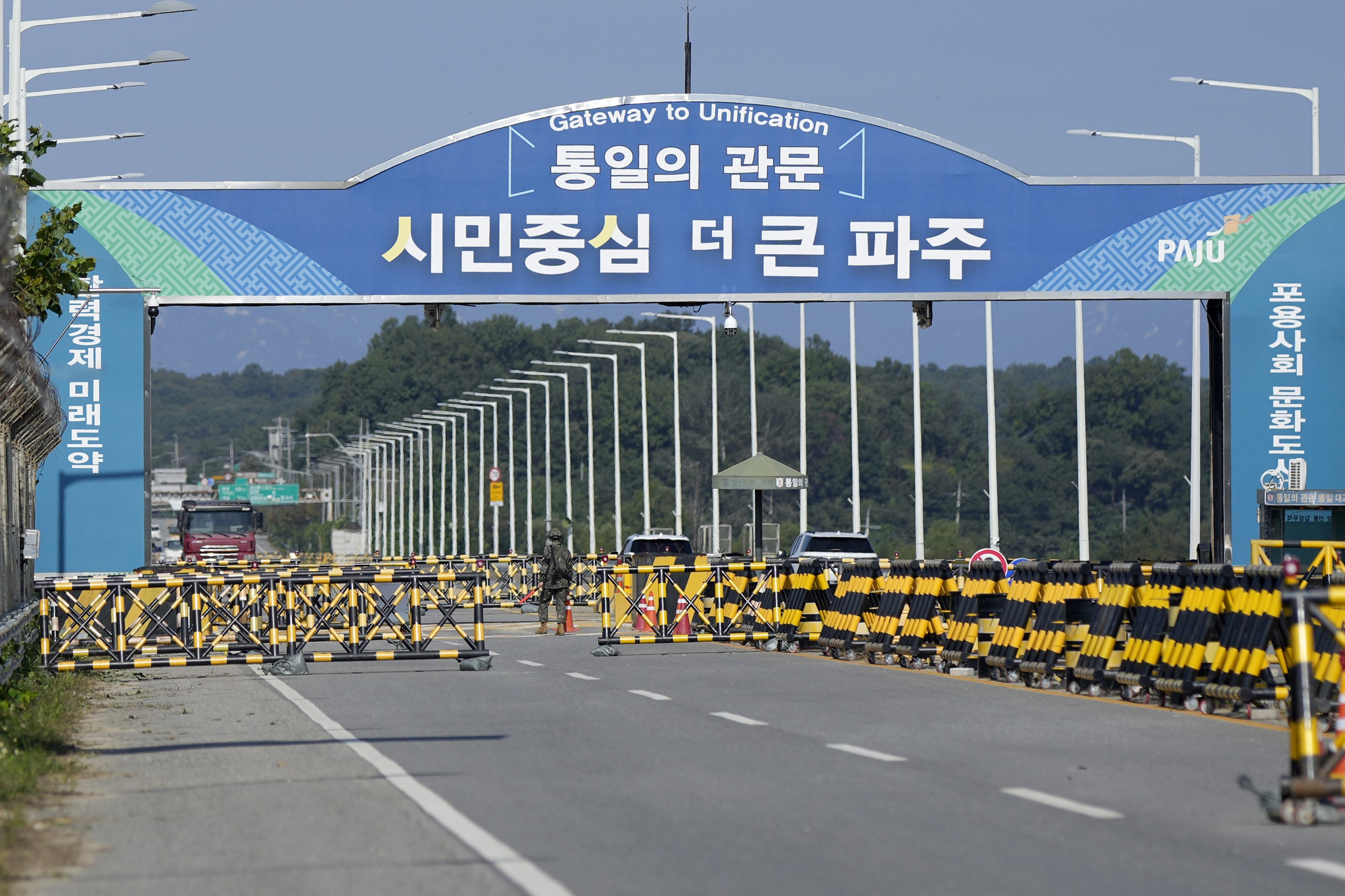 Barricades are placed near the Unification Bridge, which leads to the Panmunjom in the Demilitarized Zone in Paju, South Korea, Wednesday, Oct. 9, 2024. (AP Photo/Lee Jin-man)