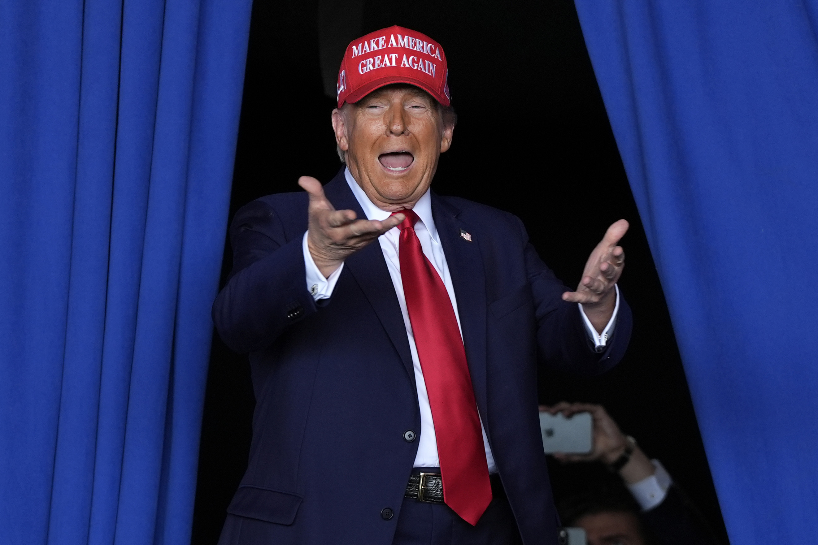 FILE - Republican presidential nominee former President Donald Trump arrives to speak during a campaign rally at Dodge County Airport, Sunday, Oct. 6, 2024, in Juneau, Wis. (AP Photo/Julia Demaree Nikhinson, File)