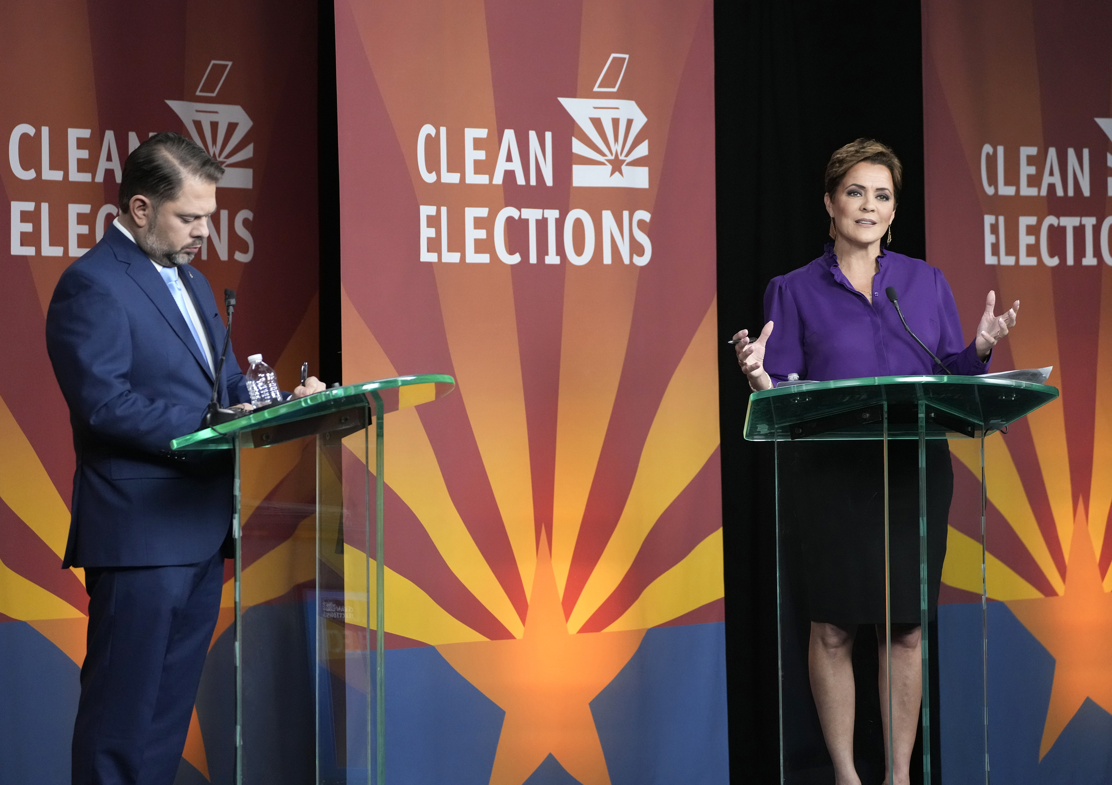 U.S. Senate candidates Rep. Ruben Gallego, D-Ariz., left, and Republican challenger Kari Lake participate in their debate, Wednesday, Oct. 9, 2024, in Phoenix. (Cheryl Evans/Arizona Republic via AP)