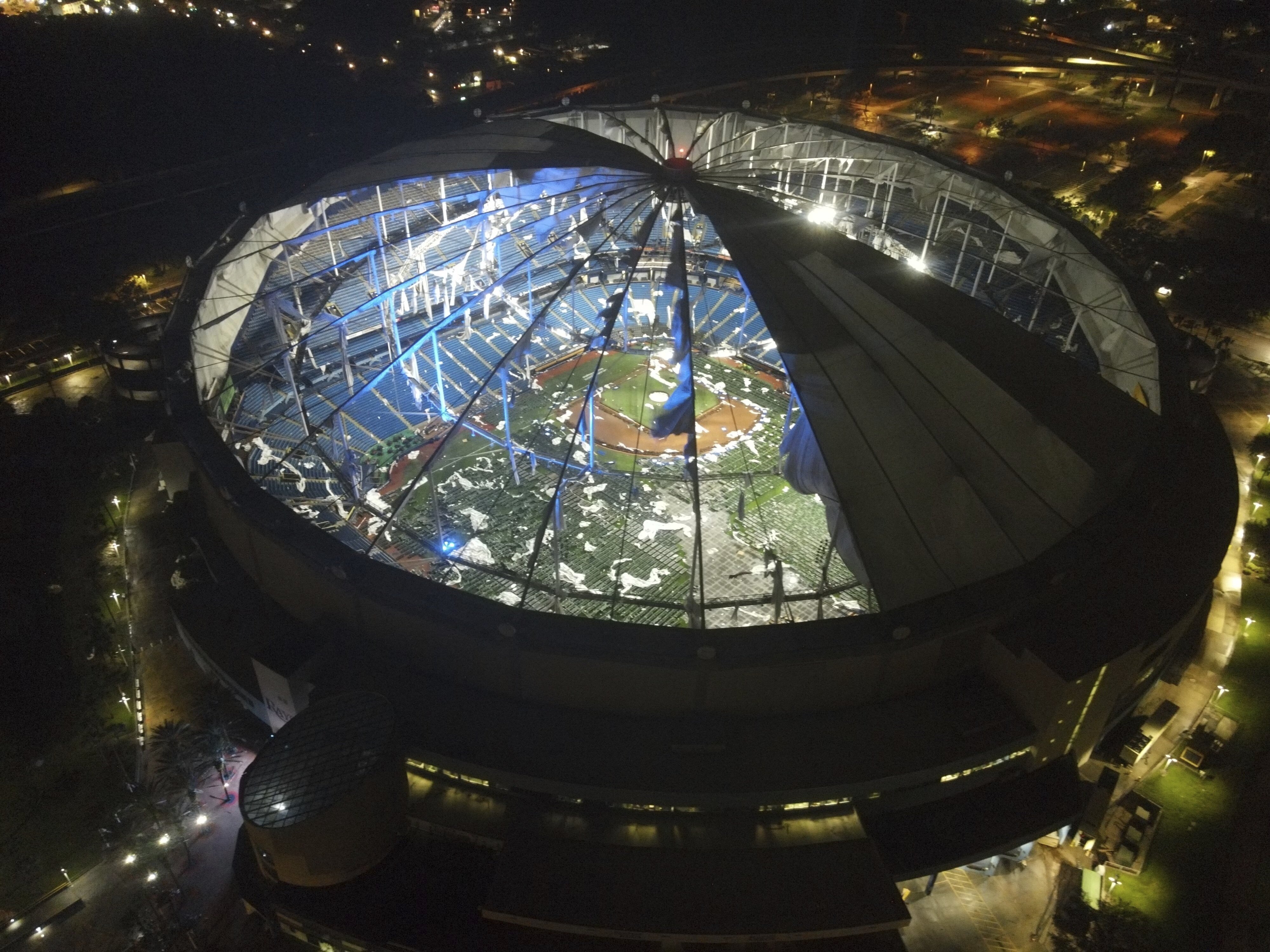 An aerial view of Tropicana Field's shredded roof in downtown St. Petersburg, Fla., in the wake of Hurricane Milton early Thursday, Oct. 10, 2024. (Max Chesnes/Tampa Bay Times via AP)