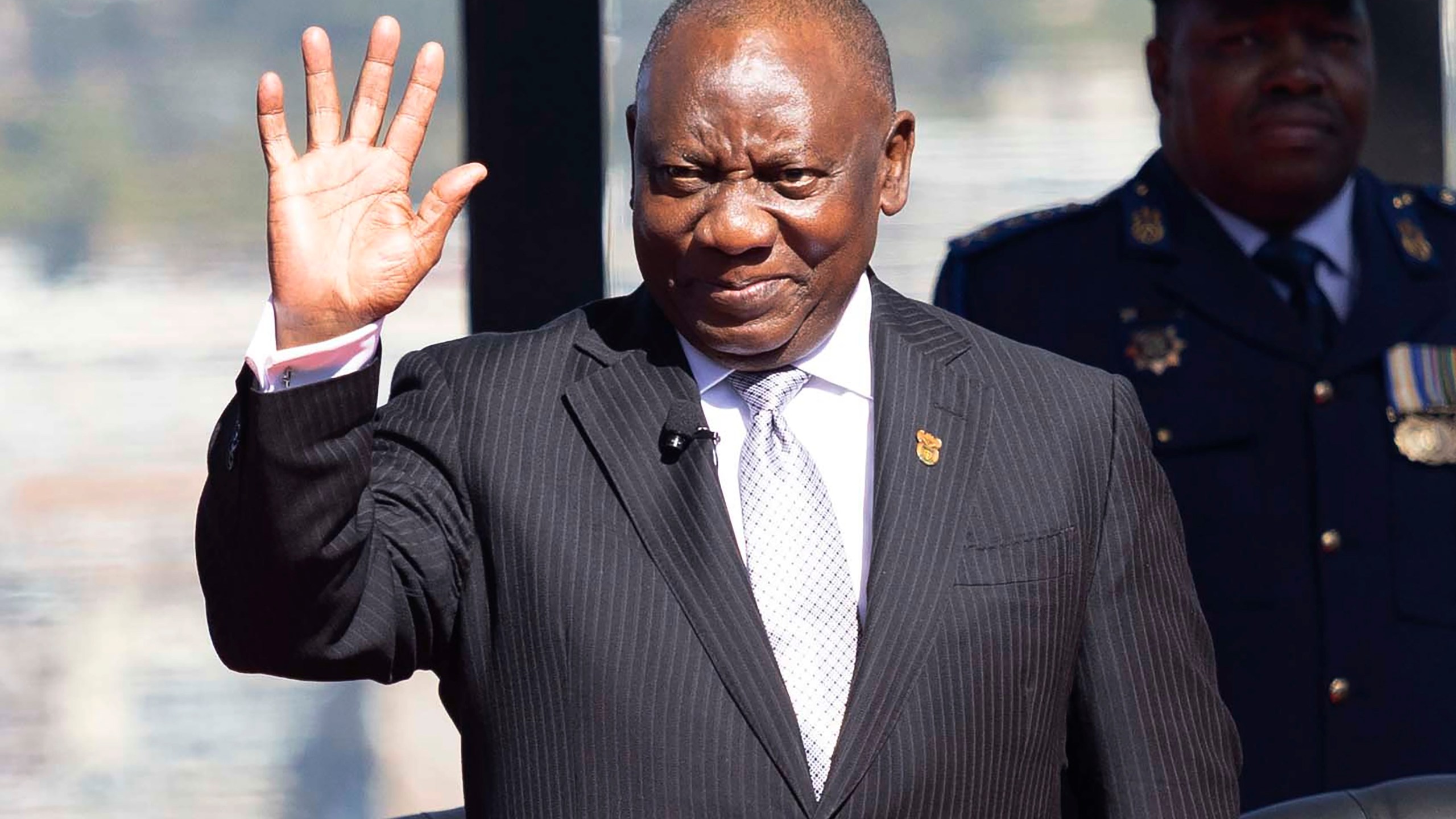 FILE - Cyril Ramaphosa waves as he arrives ahead of his inauguration as President, at the Union Buildings in Tshwane, South Africa, June 19, 2024. (Kim Ludbrook/Pool Photo via AP, File)