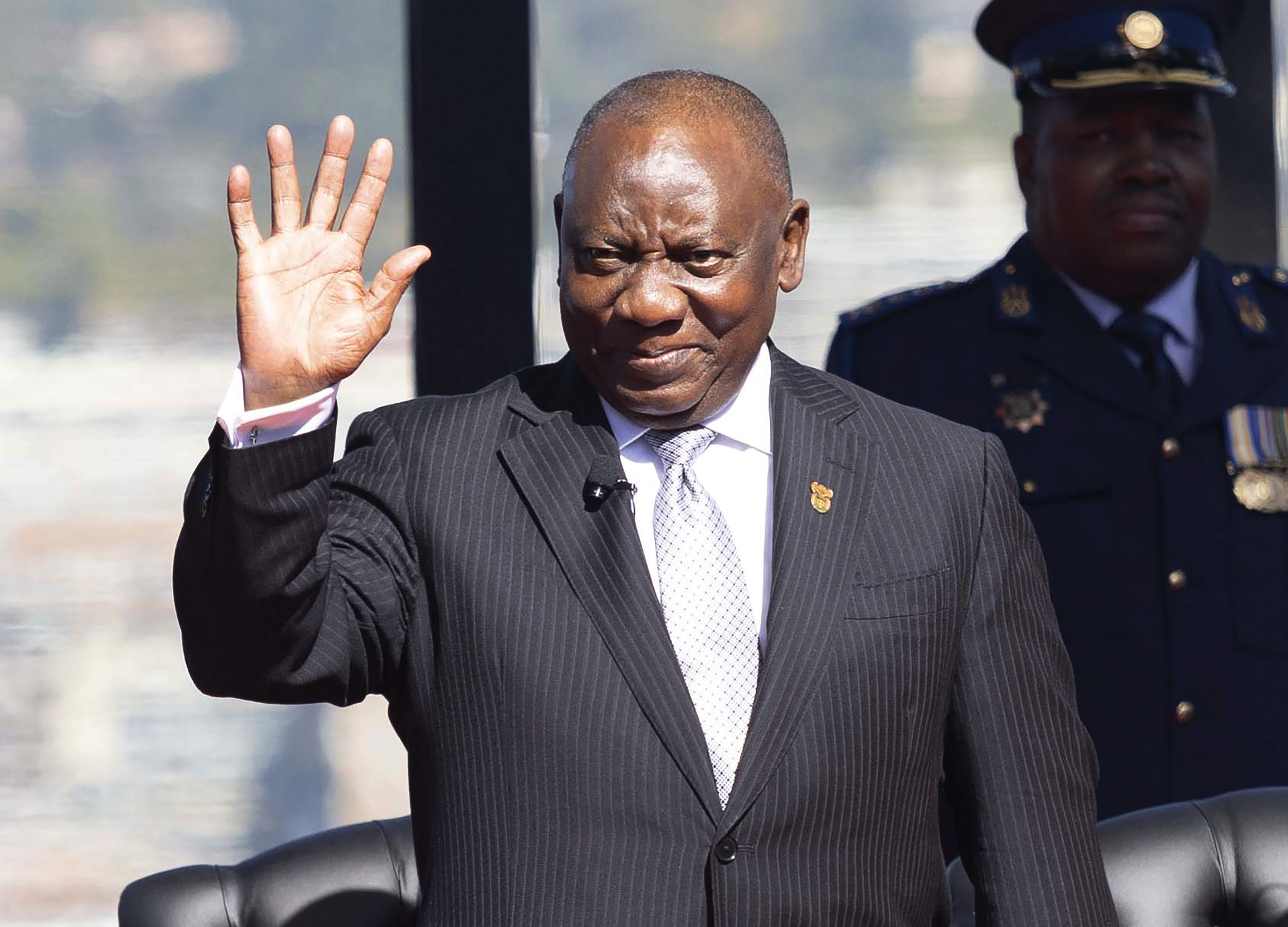 FILE - Cyril Ramaphosa waves as he arrives ahead of his inauguration as President, at the Union Buildings in Tshwane, South Africa, June 19, 2024. (Kim Ludbrook/Pool Photo via AP, File)