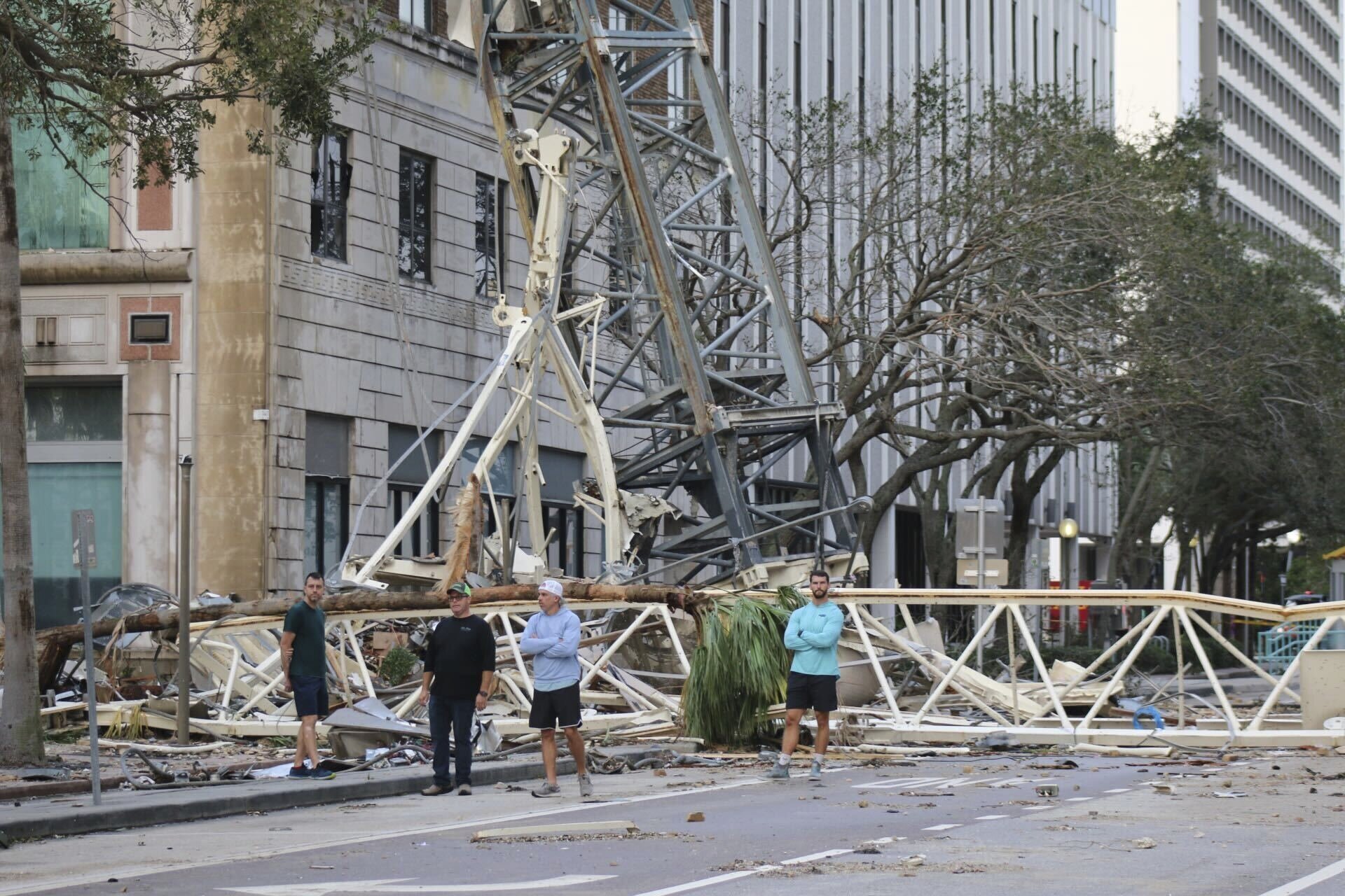 A construction crane fell over into an office building that houses the Tampa Bay Times headquarters, after Hurricane Milton, Thursday, Oct. 10, 2024. (Tampa Bay Times via AP)