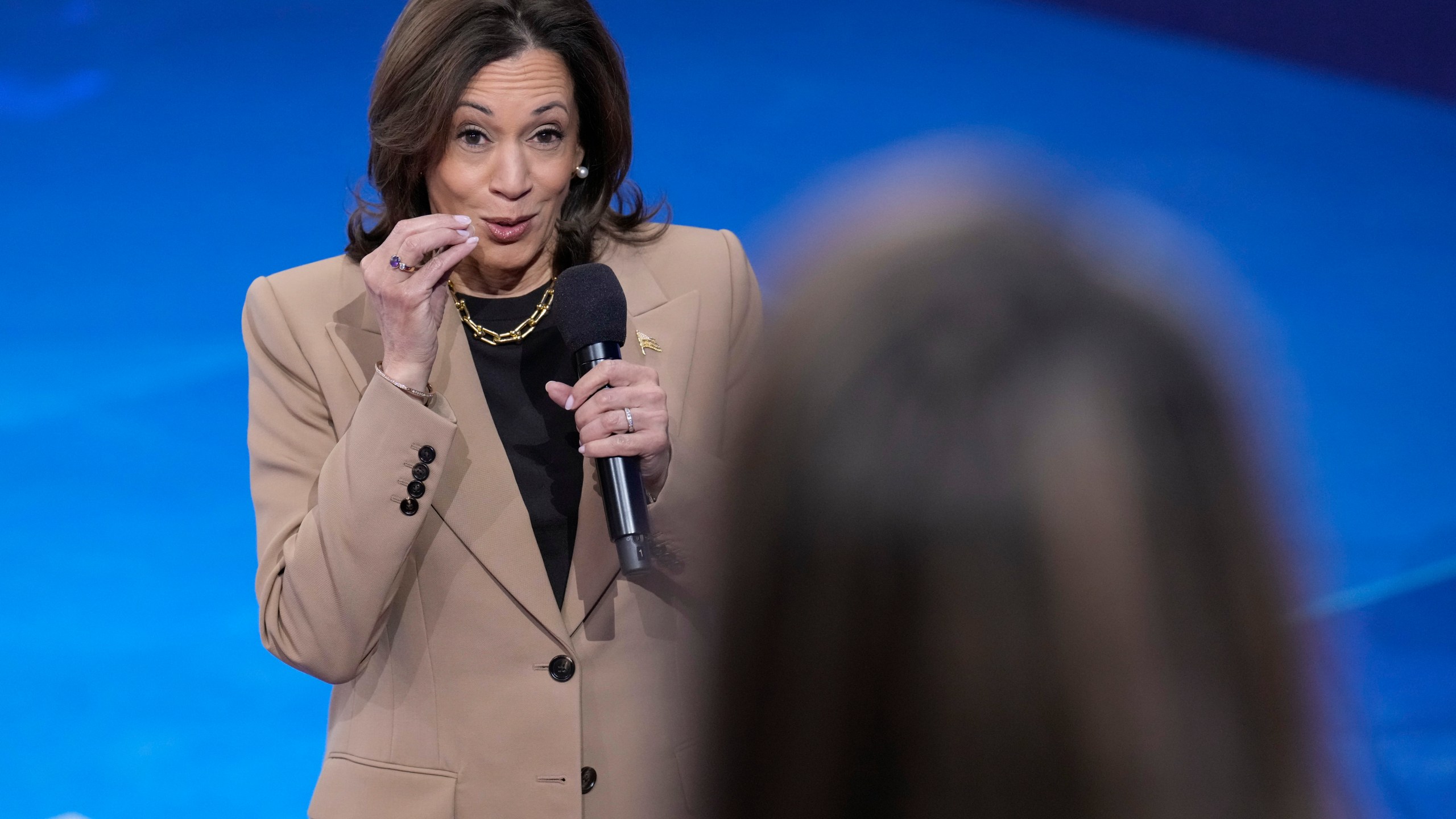 Democratic presidential nominee Vice President Kamala Harris responds to a question from Ivett Castillo, of Las Vegas, during a Town Hall event hosted by Univision, Thursday, Oct. 10, 2024, at the University of Nevada Las Vegas. (AP Photo/Jacquelyn Martin)